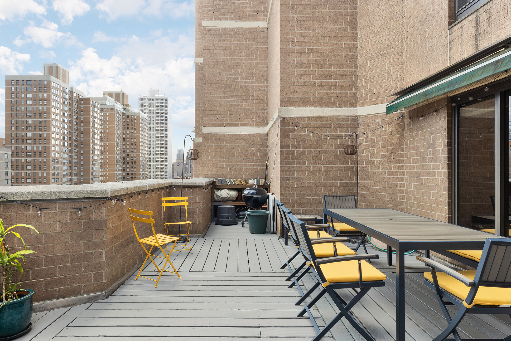 111 East 30th Street, Unit 16C Manhattan, NY 10016 - Photo 2 of 13 a view of a balcony with lounge chair