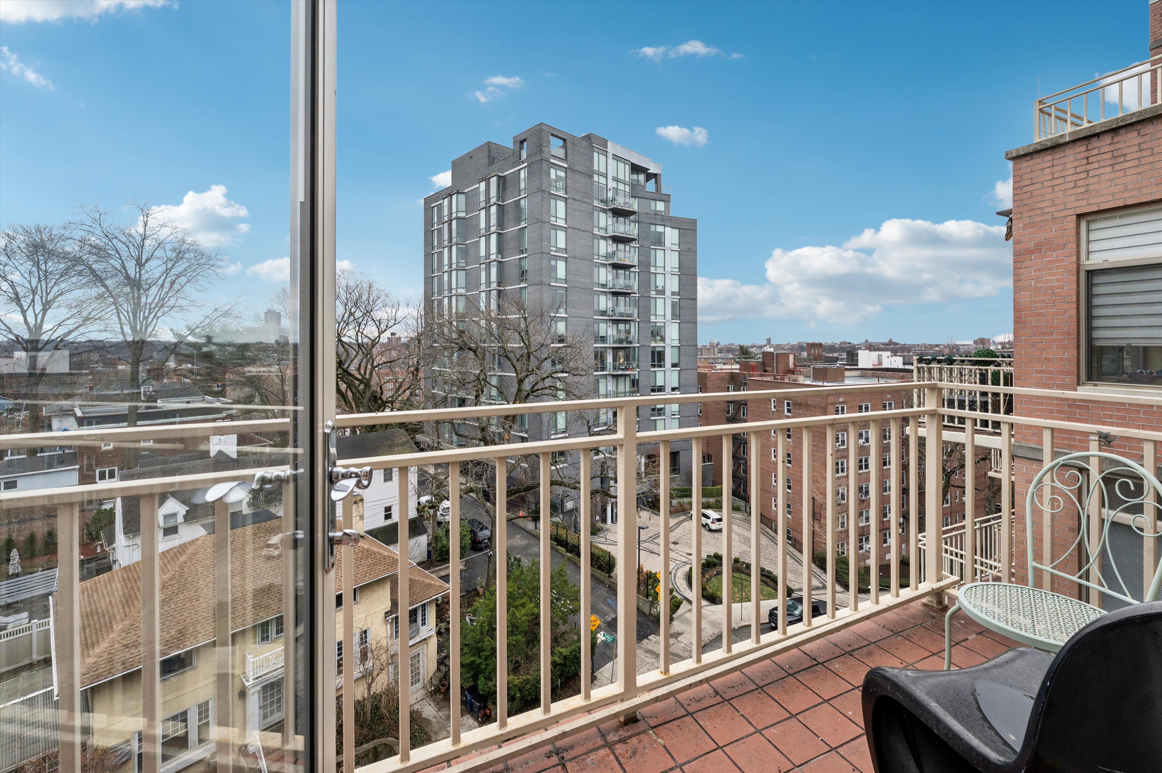 3625 Oxford Avenue, Unit 7C Bronx, NY 10463 - Photo 7 of 20 a view of a balcony with wooden floor