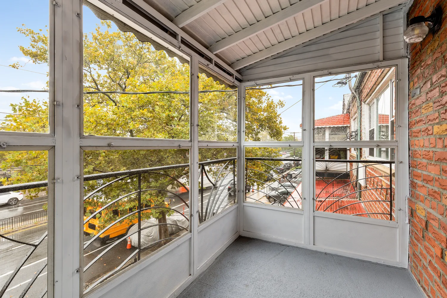 wooden floor to ceiling window with an outdoor view