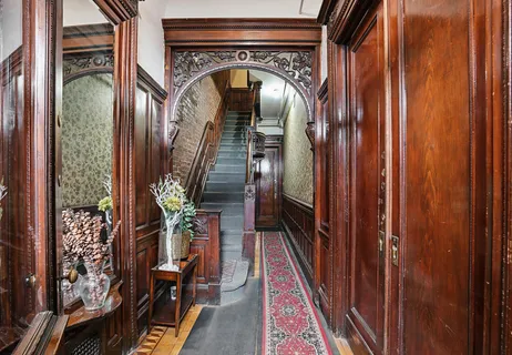 a view of an entryway with a flower pot