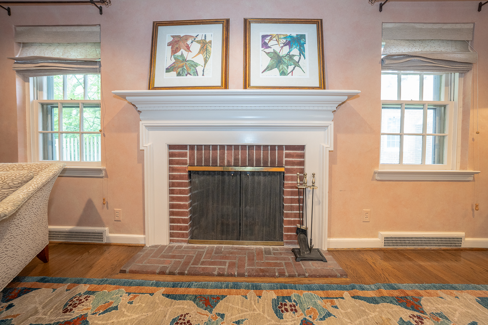 519 Mercer Road Merion Station, PA 19066 - Photo 27 of 58 a living room with a fireplace and windows
