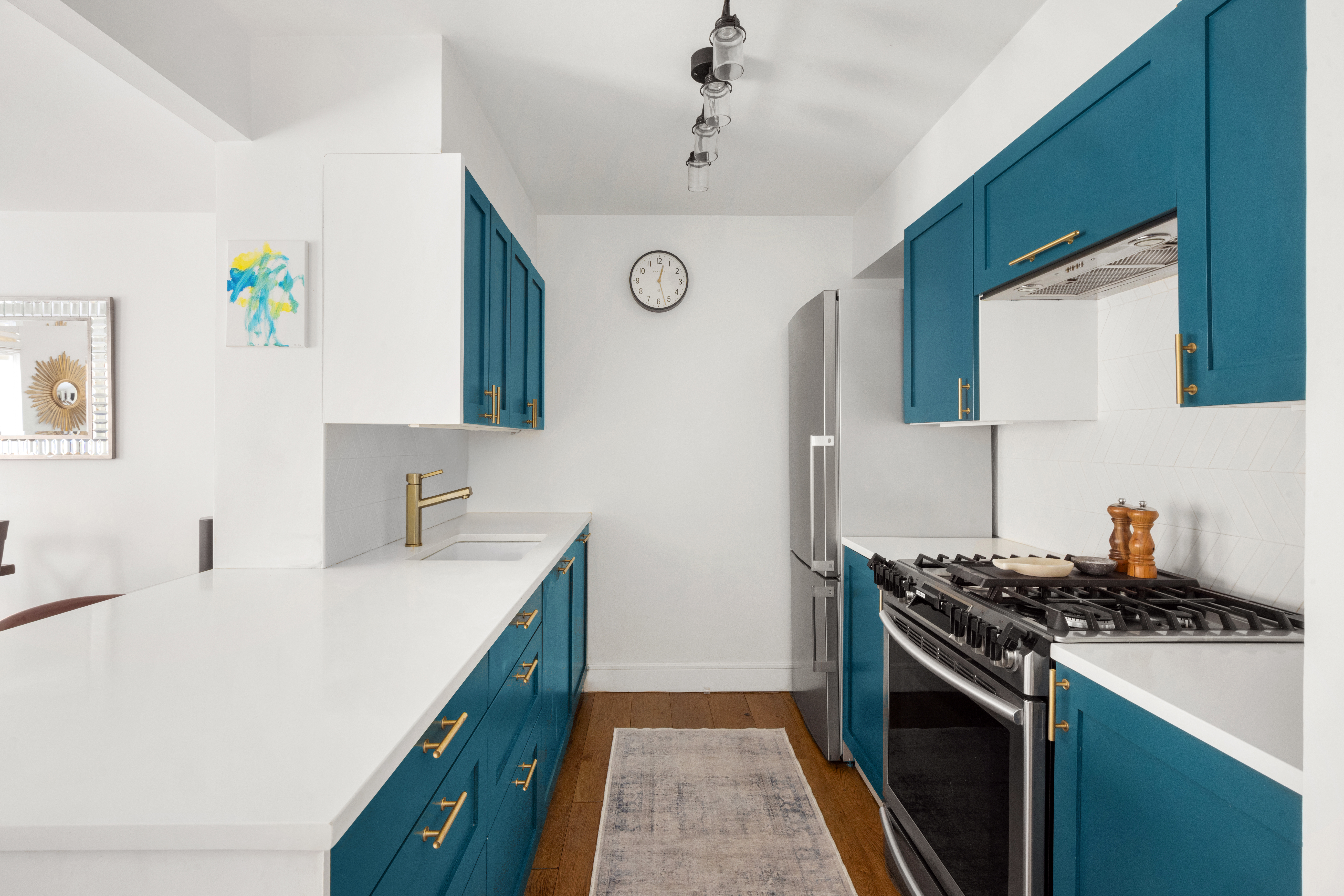 333 East 119th Street, Unit 1H Manhattan, NY 10035 - Photo 10 of 17 a kitchen with a stove and a sink