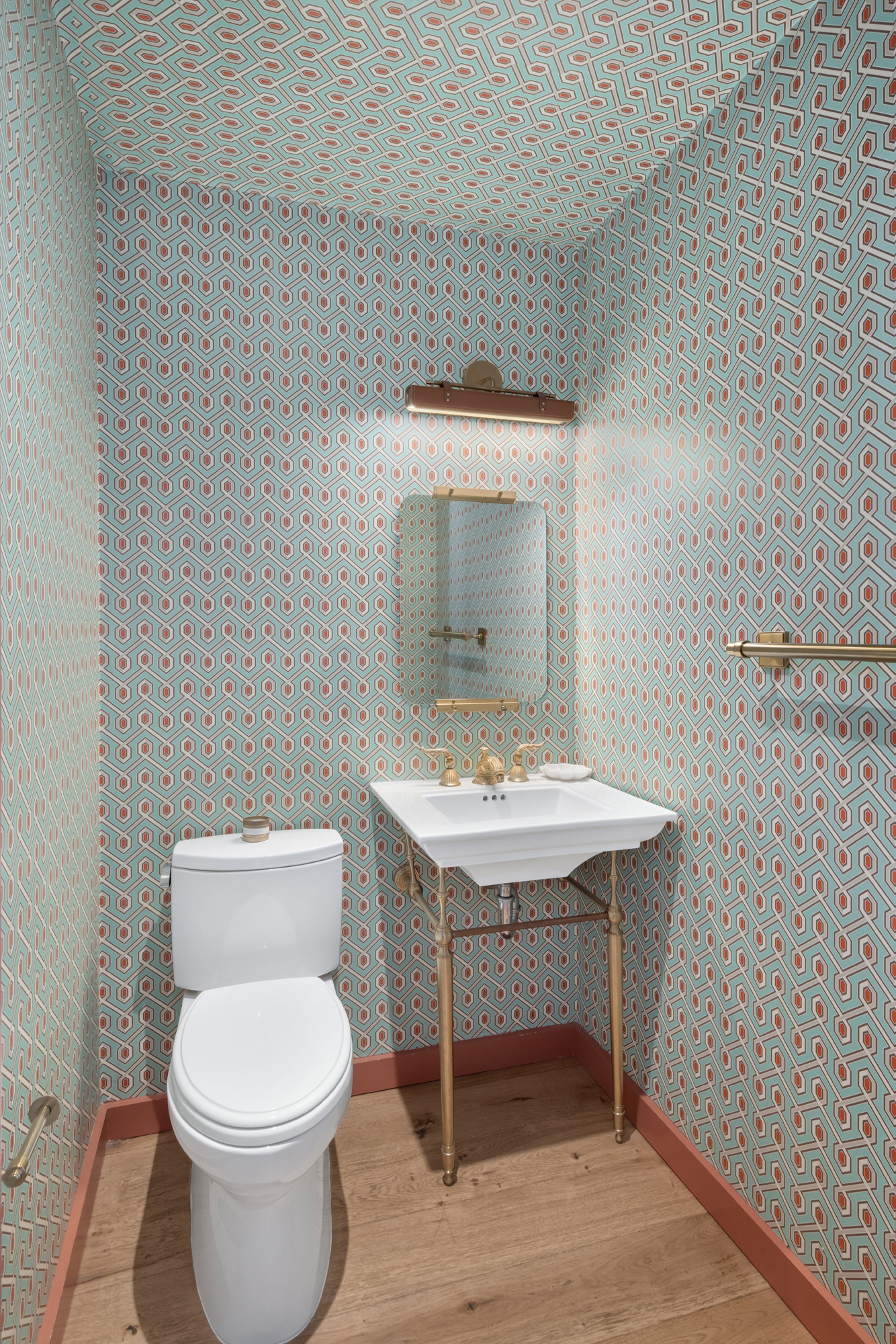 683 Leonard Street Brooklyn, NY 11222 - Photo 10 of 25 a bathroom with a sink a toilet and mirror