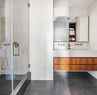 a bathroom with a bathtub and a sink