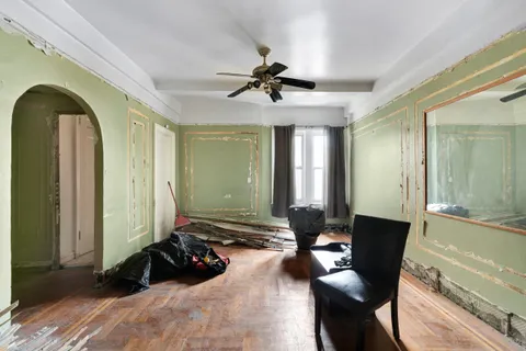 a room with furniture and a large window