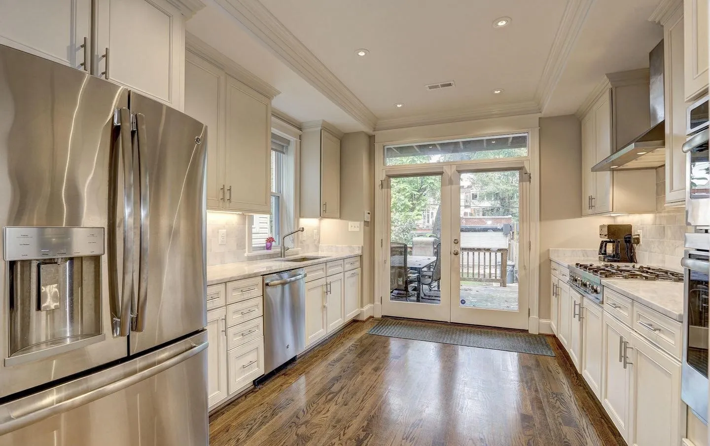 a bathroom with a sink a vanity and a mirror