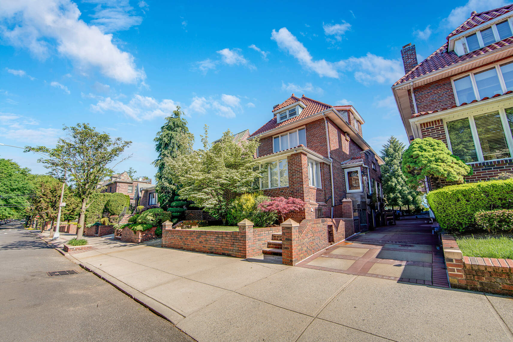 139 82nd Street Brooklyn, NY 11209 - Photo 3 of 23 a front view of a house with a garden
