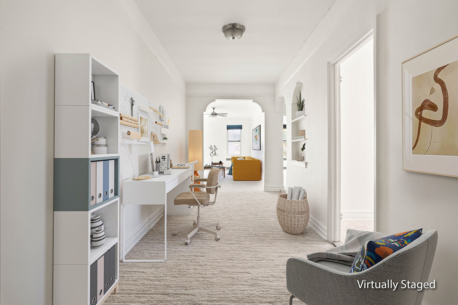 72-17 34th Avenue, Unit 4J Queens, NY 11372 - Photo 2 of 14 a living room with furniture a rug and white walls