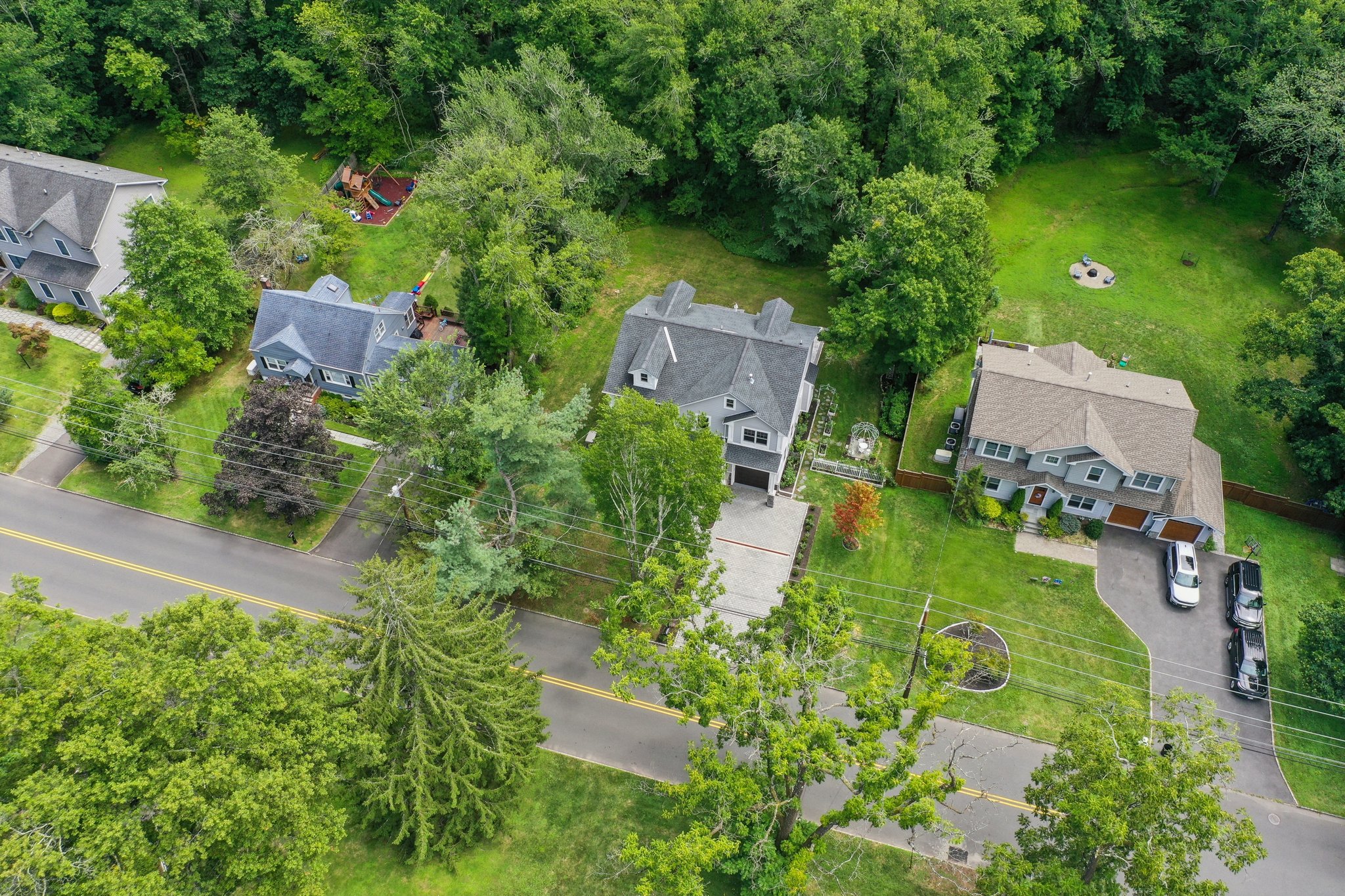 823 River Road Chatham, NJ 07928 - Photo 54 of 60 an aerial view of a house with garden space sitting space and swimming pool