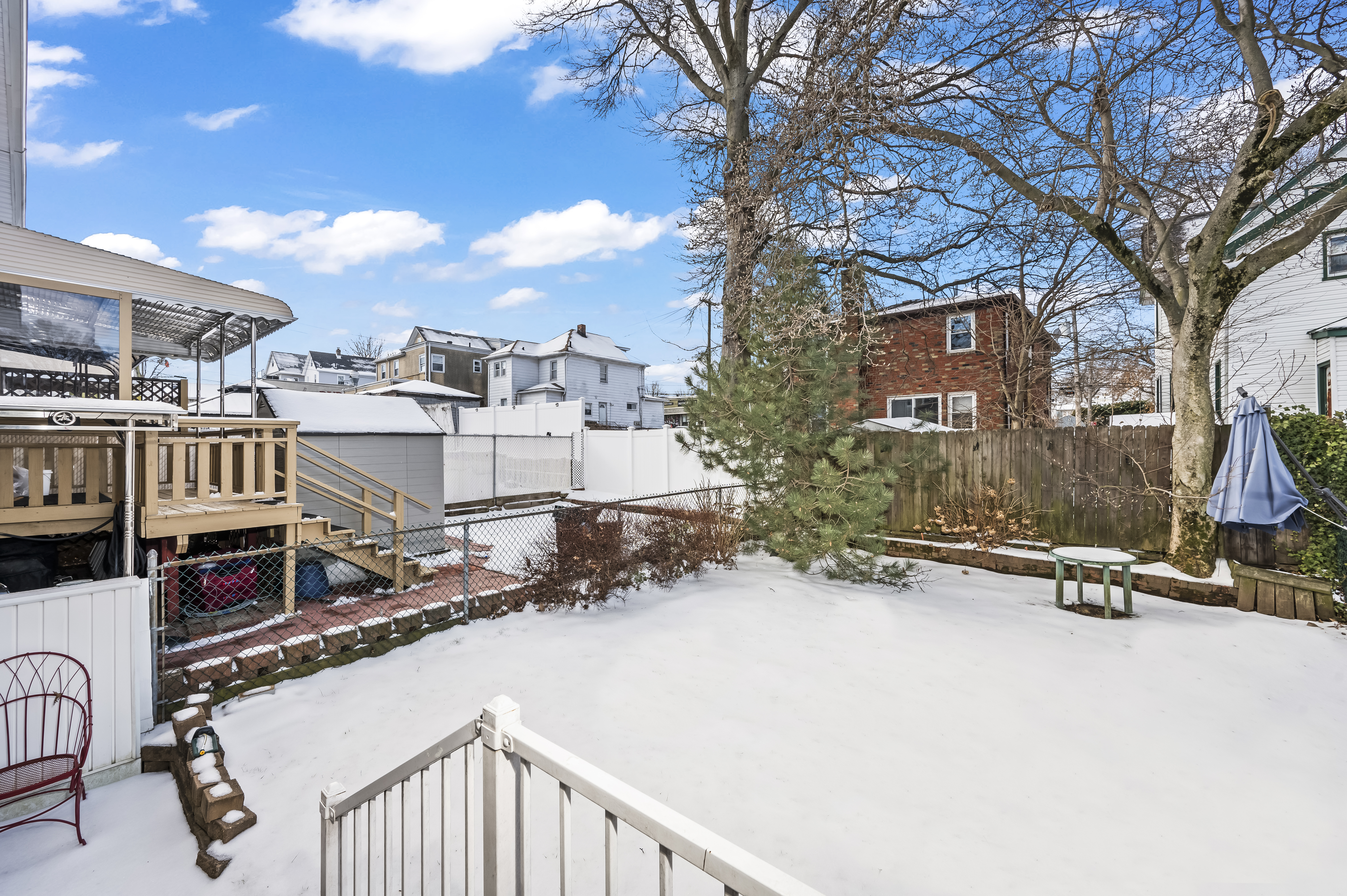 15 Area Place Staten Island, NY 10314 - Photo 23 of 27 a view of a house with backyard porch and sitting area