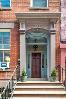 a view of a entryway of the house front of house