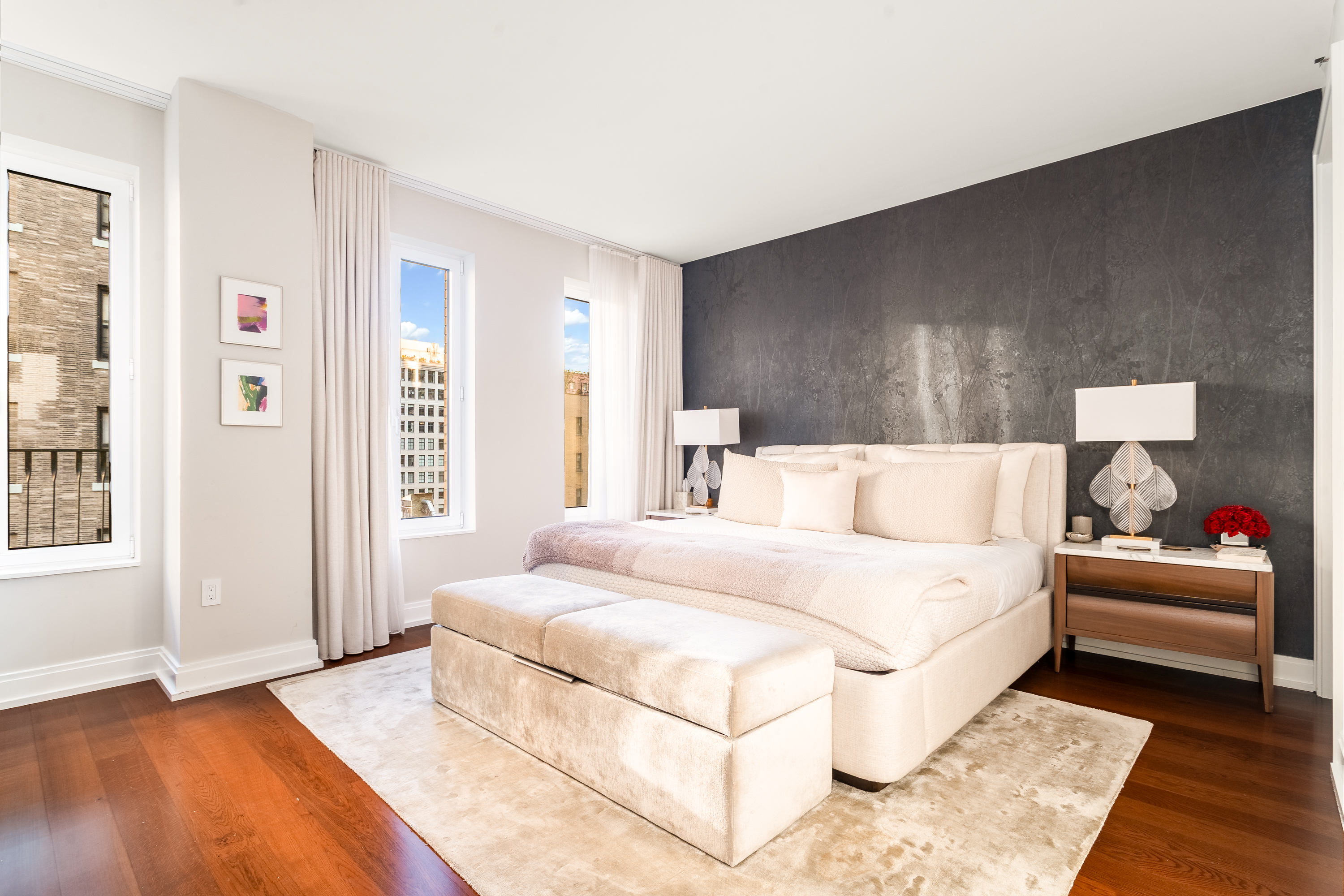 230 West 78th Street, Unit 8A Manhattan, NY 10024 - Photo 7 of 12 a spacious bedroom with a bed and a couch