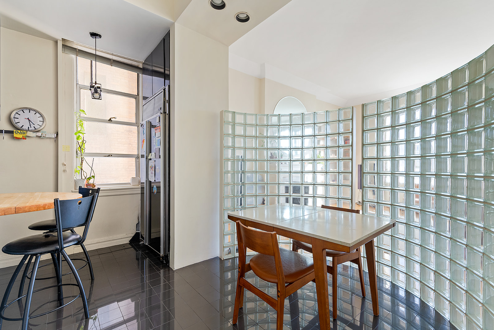11 West 81st Street, Unit 6A Manhattan, NY 10024 - Photo 5 of 13 a workspace room with furniture and a window