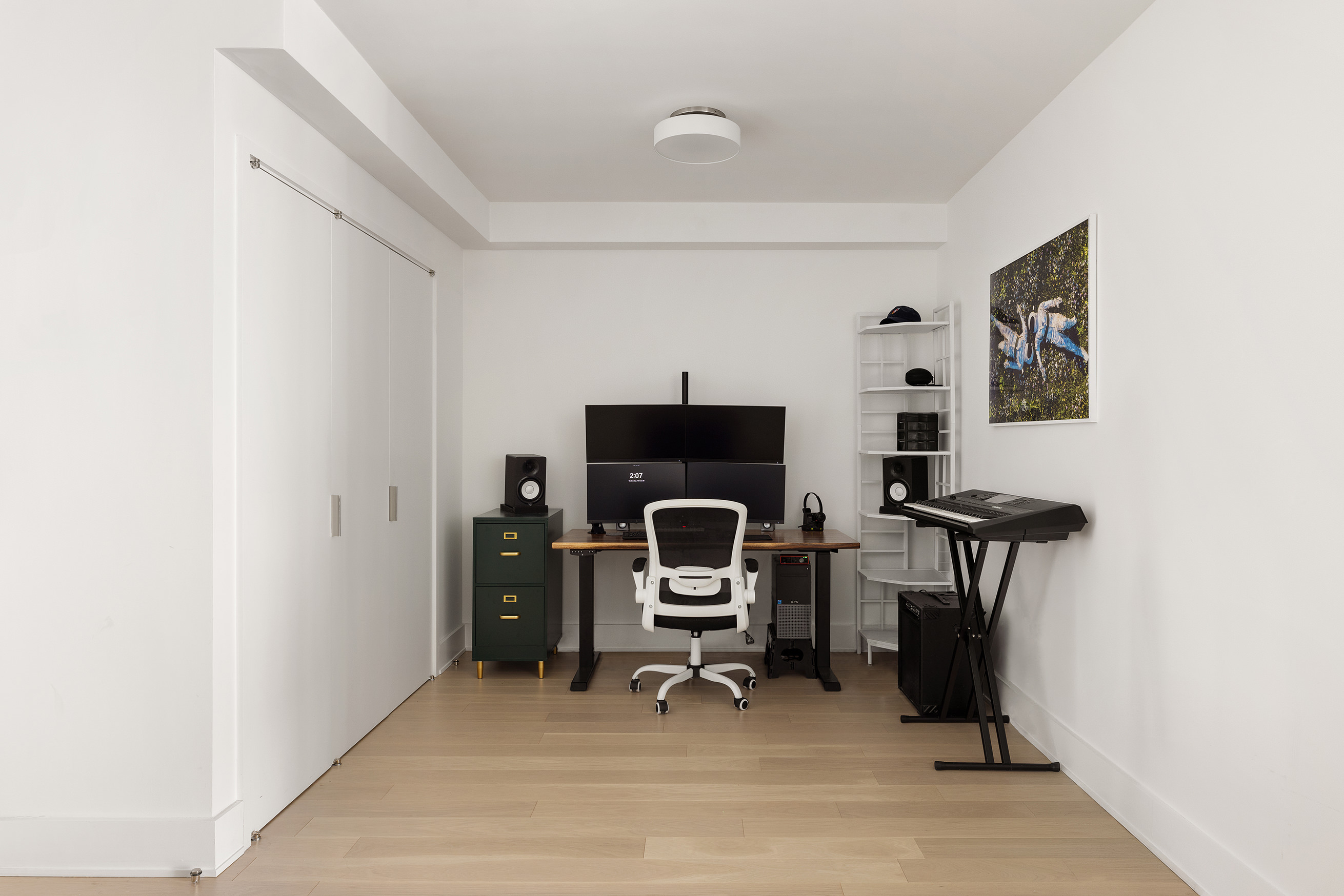 20 River Terrace, Unit 10G Manhattan, NY 10282 - Photo 5 of 21 a view of a workspace with furniture and a window