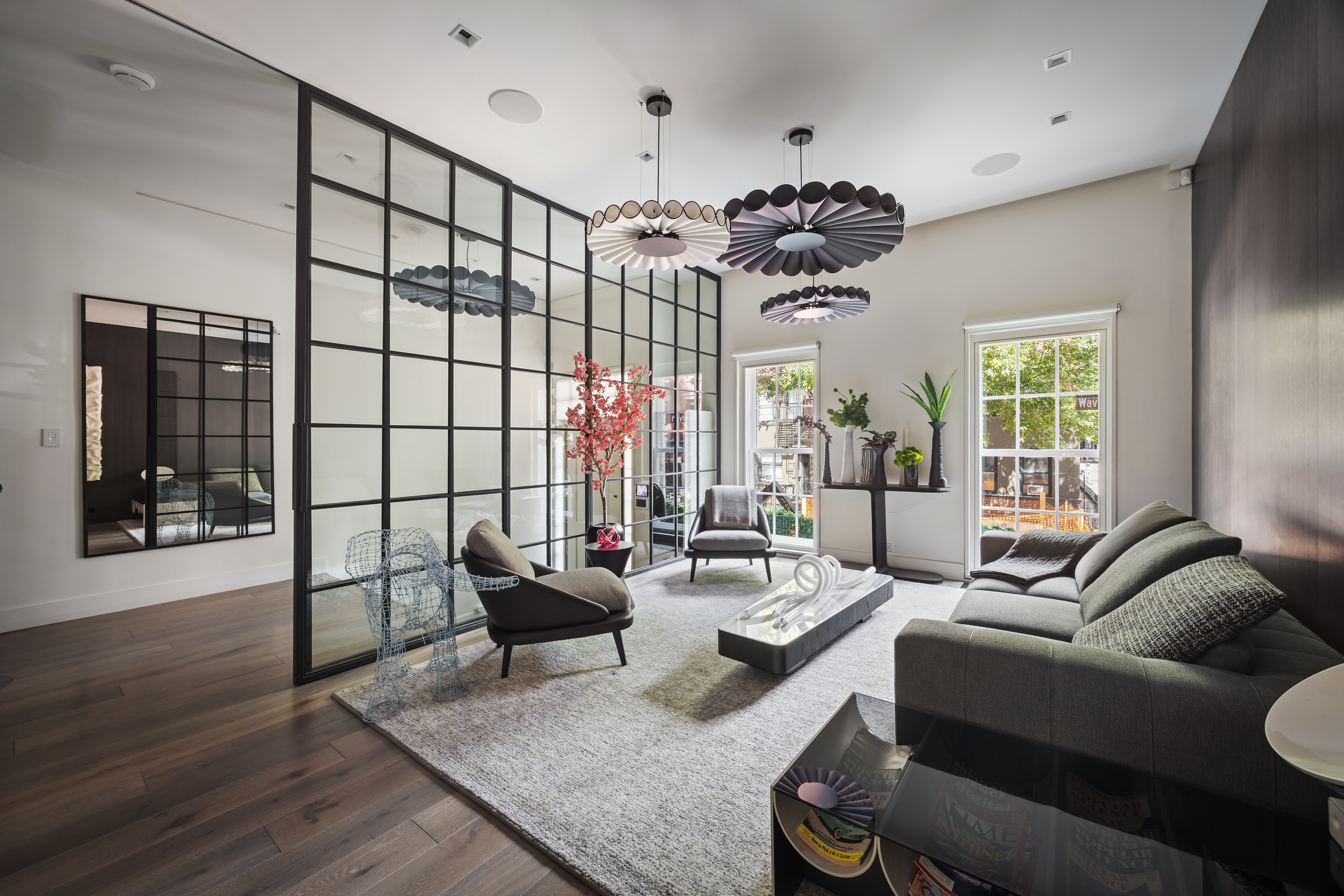 146 Waverly Place Manhattan, NY 10014 - Photo 10 of 41 a living room with furniture and a large window