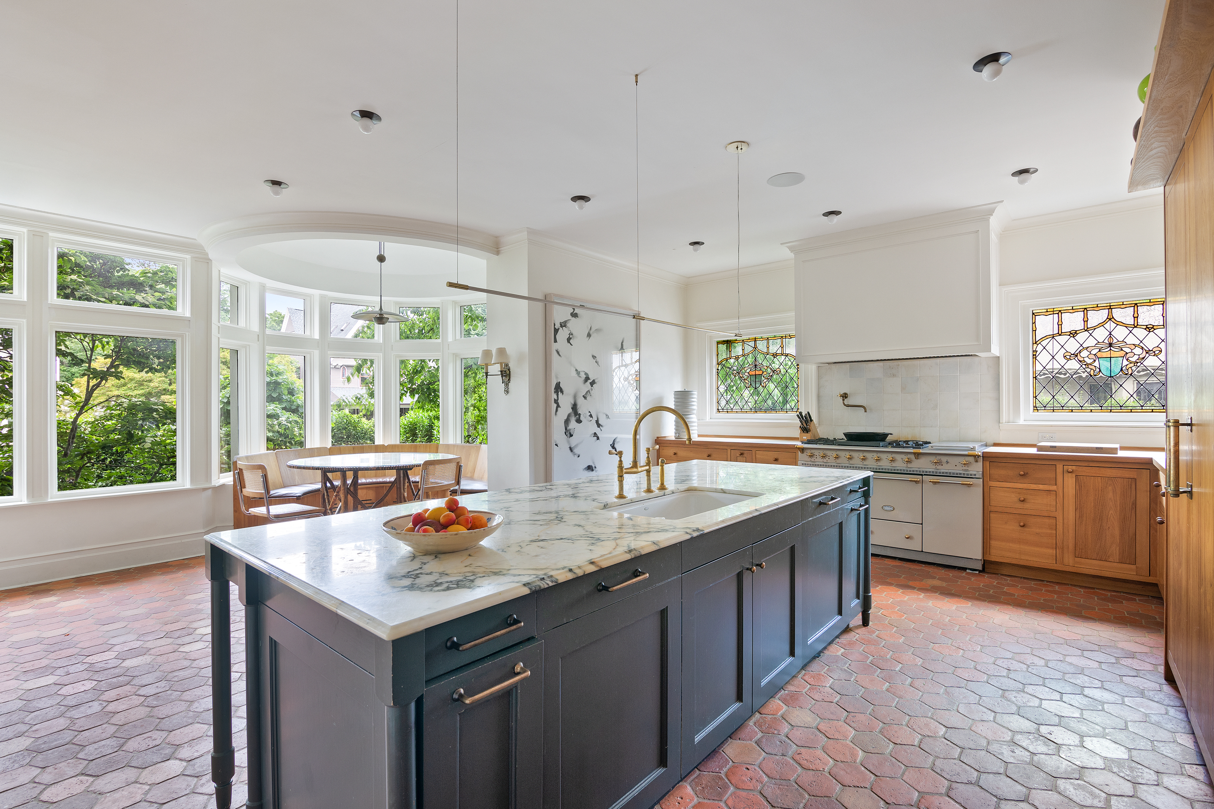 1440 Albemarle Road Brooklyn, NY 11226 - Photo 11 of 39 a kitchen with a sink stove and wooden cabinets