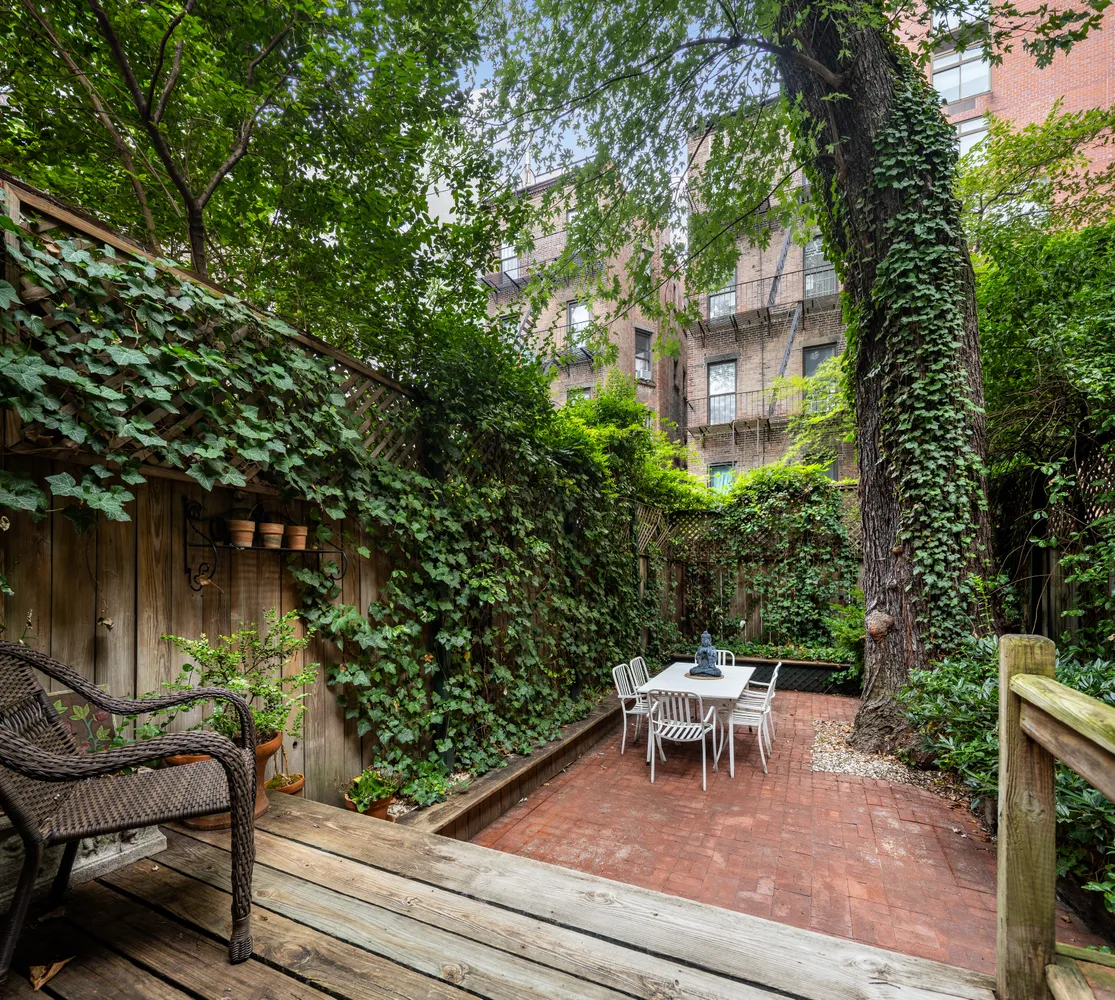 a house view with a outdoor seating space