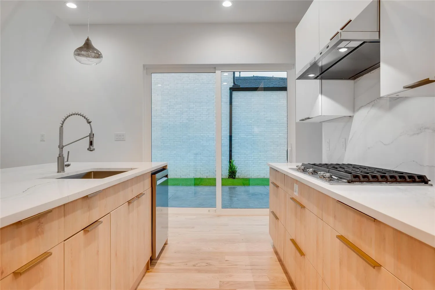a kitchen with a stove and a sink