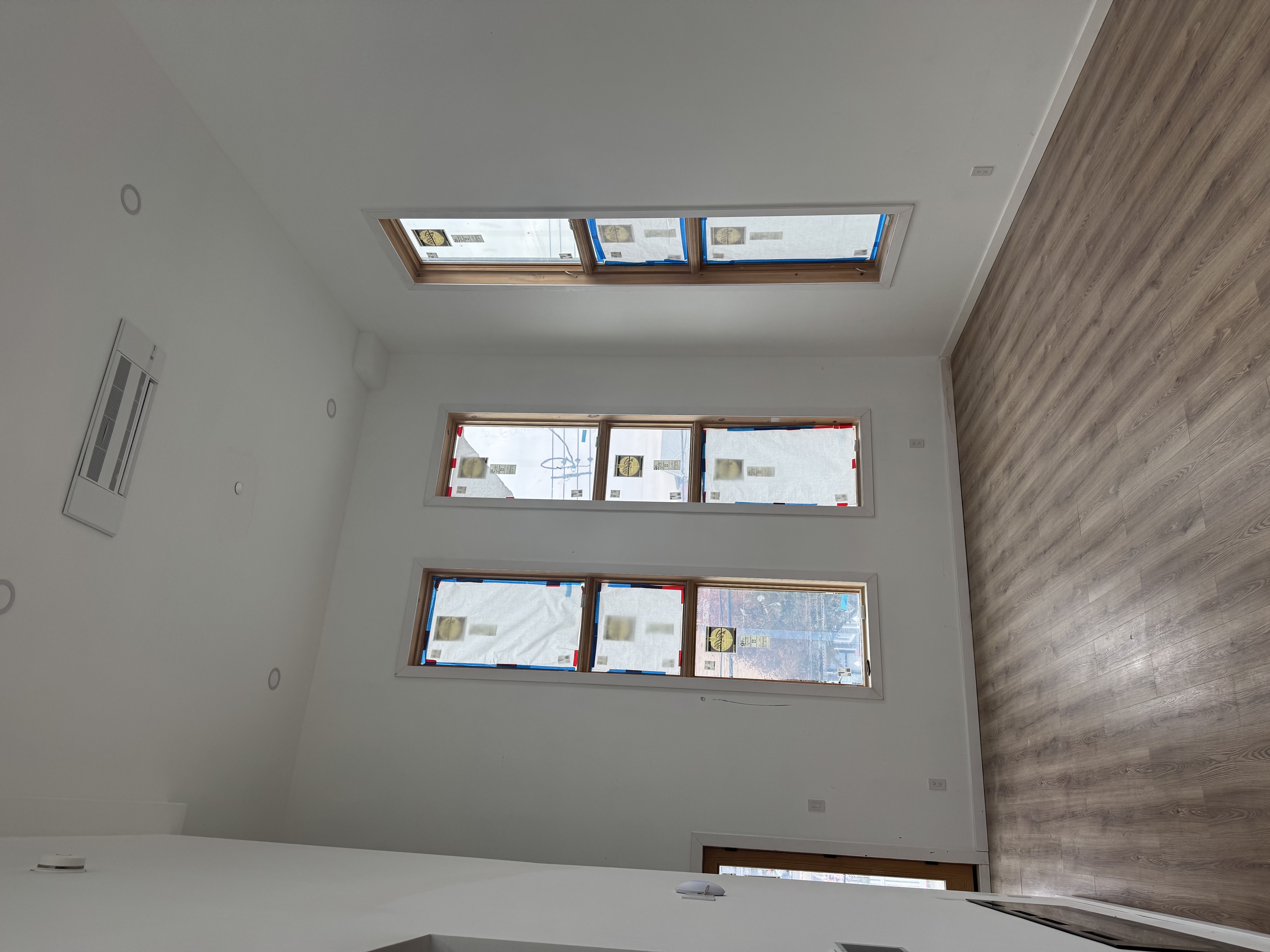 2811 Brown Street Brooklyn, NY 11235 - Photo 2 of 3 an empty room with windows