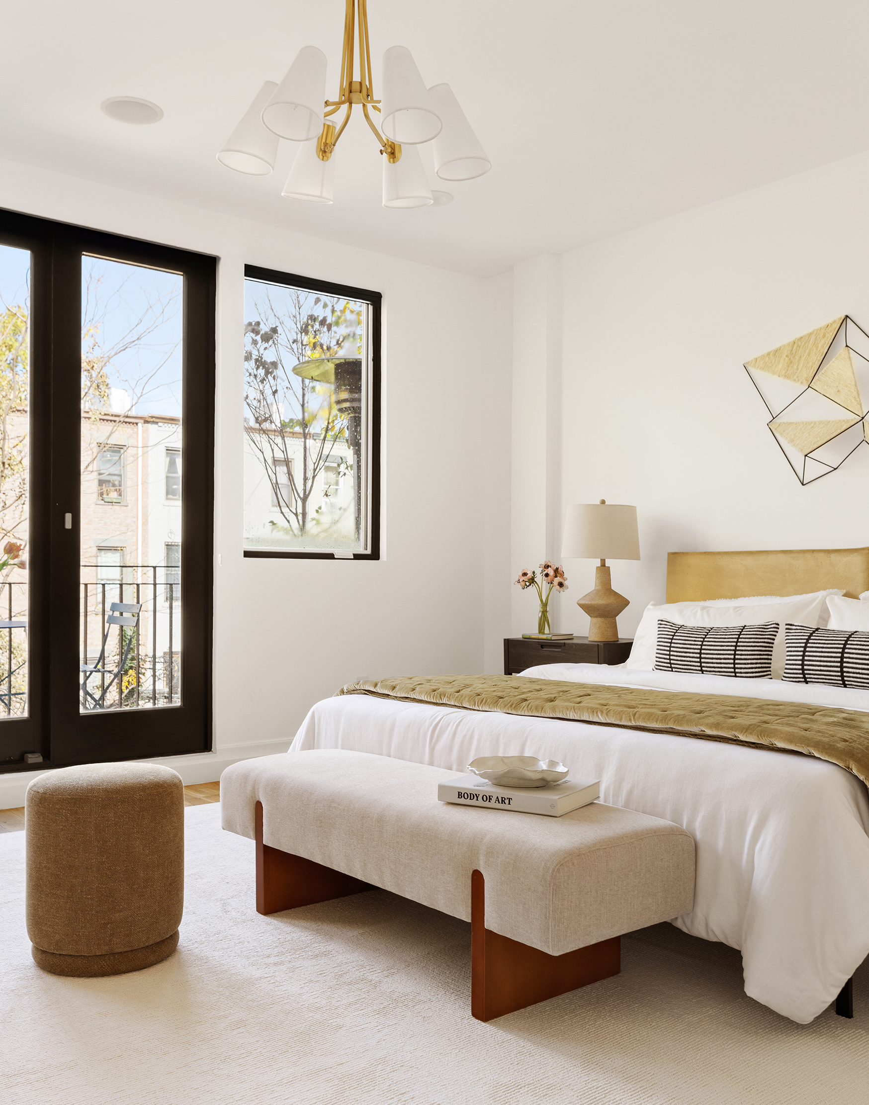 203 Halsey Street Brooklyn, NY 11216 - Photo 6 of 21 a bedroom with a large bed and a couch