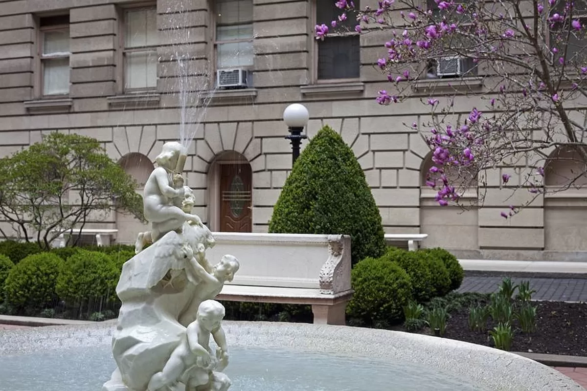 390 West End Avenue, Unit 7DS Manhattan, NY 10024 - Photo 30 of 31 a picture of a building with a lot of flower plants