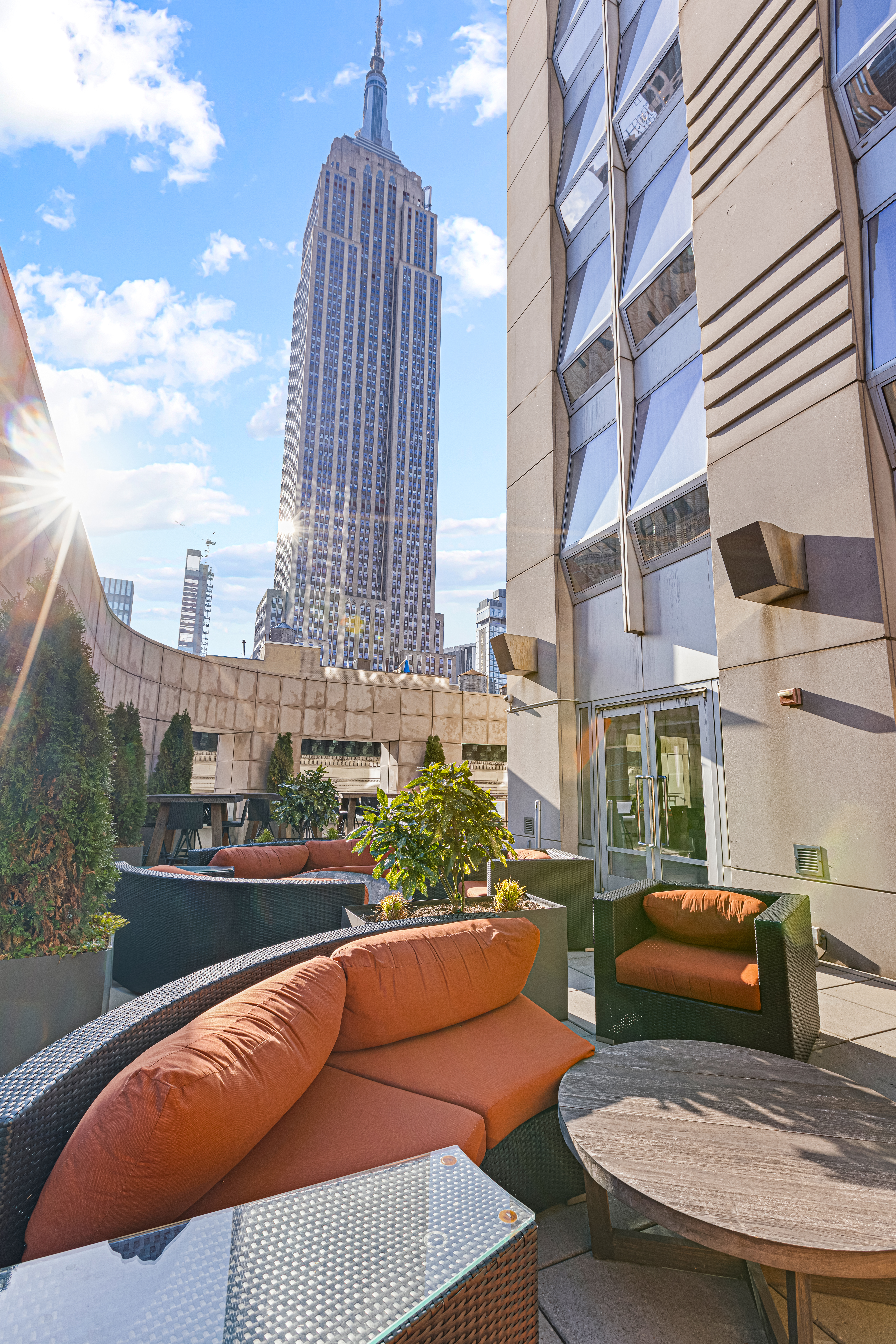 400 5th Avenue, Unit 49C Manhattan, NY 10018 - Photo 15 of 21 a view of a balcony with chairs