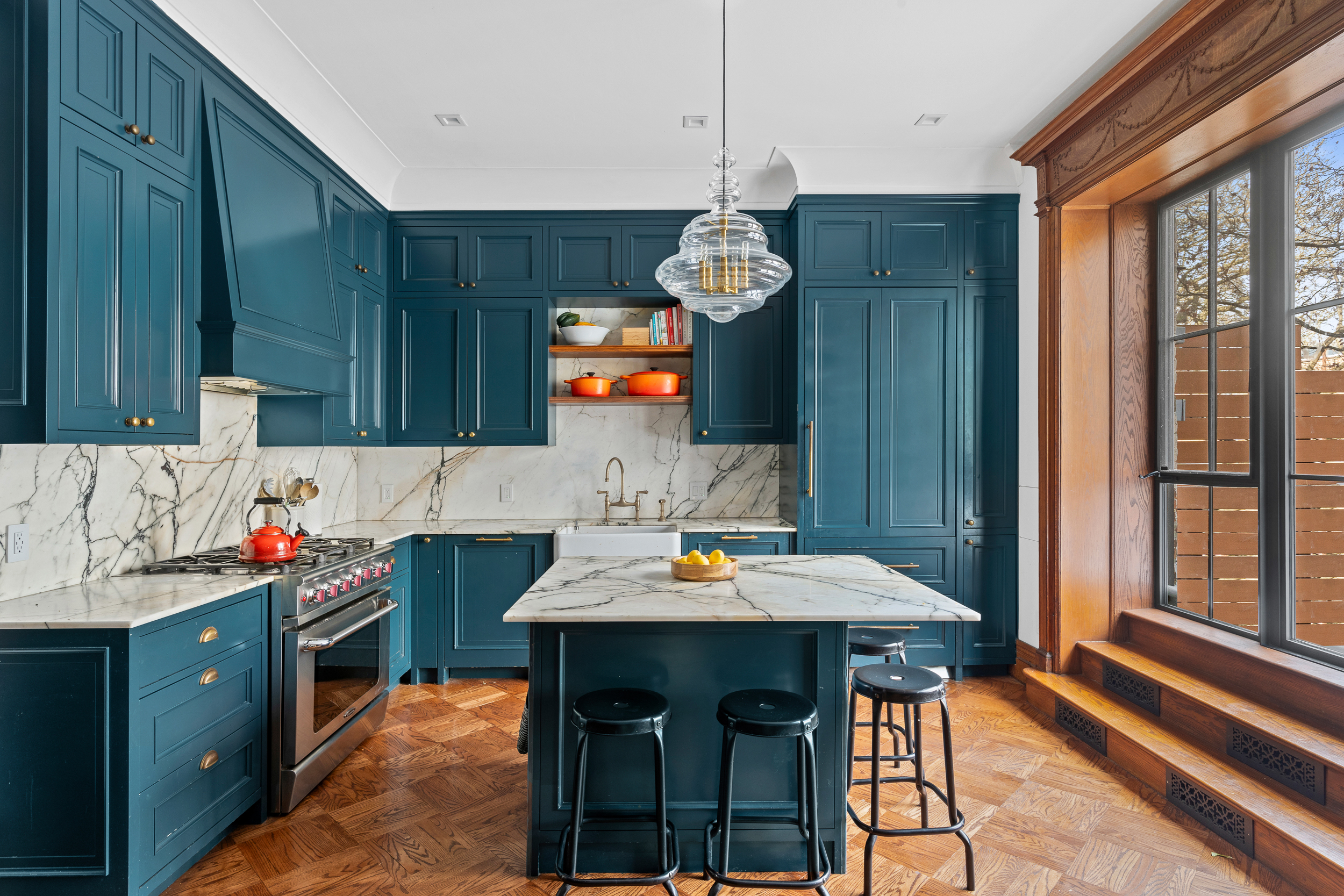479 4th Street, Unit TRIPLEX Brooklyn, NY 11215 - Photo 5 of 17 a kitchen with a table and chairs in it