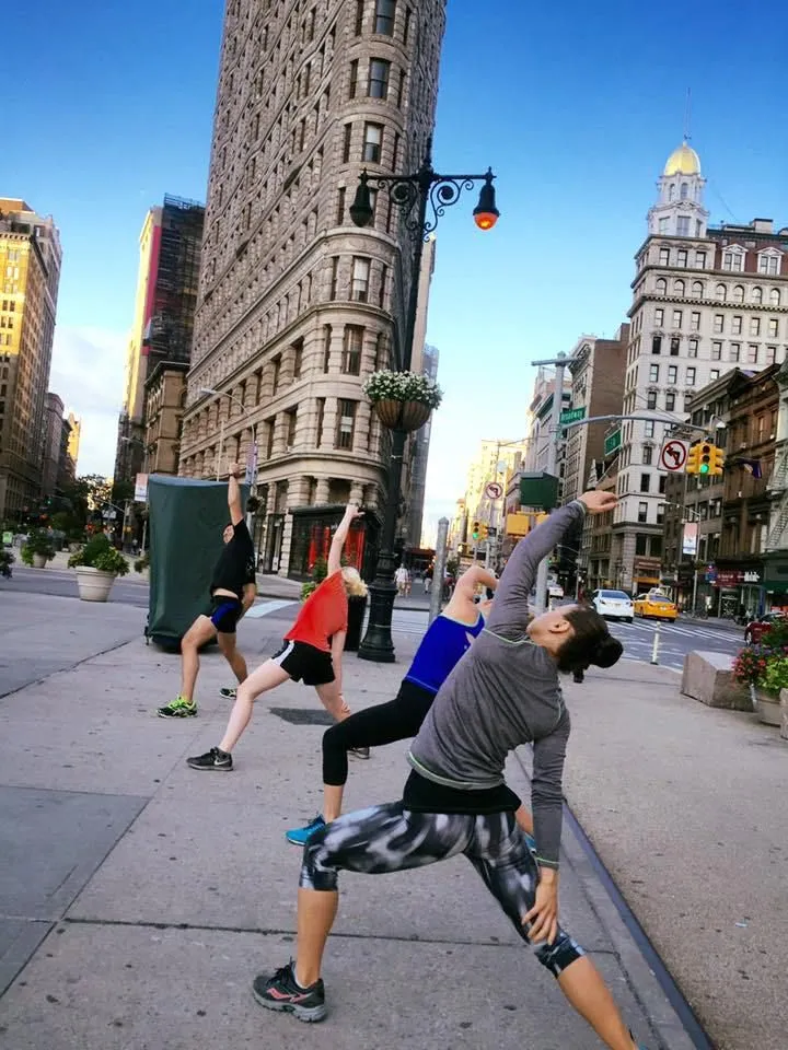 a view of a street with seating area