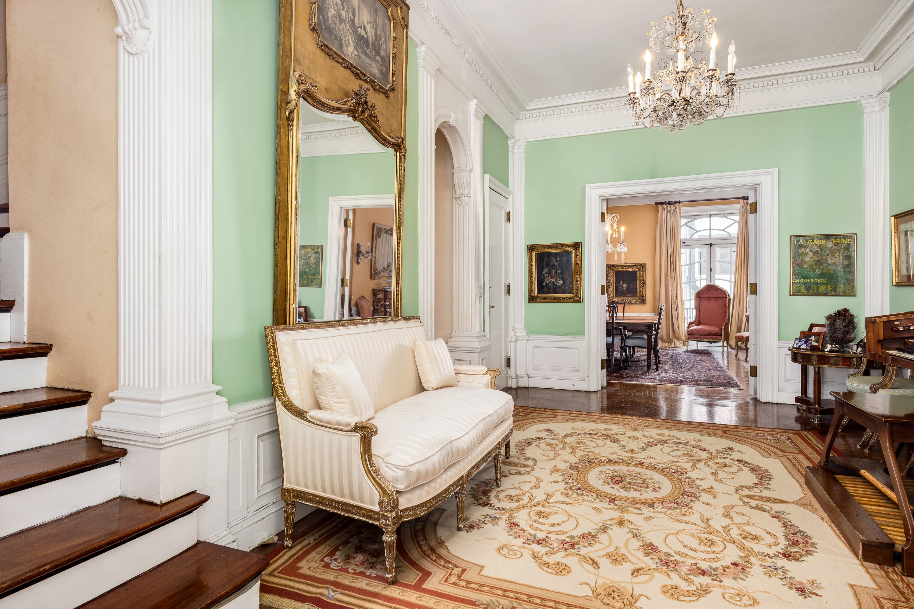 21 East 81st Street Manhattan, NY 10028 - Photo 7 of 21 a living room with furniture and a chandelier