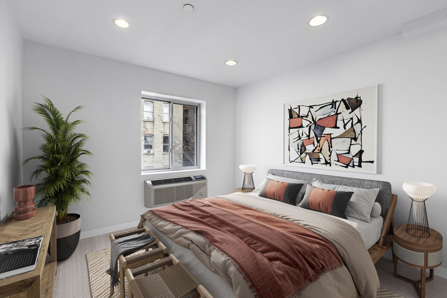 371 West 126th Street, Unit GARDEN Manhattan, NY 10027 - Photo 3 of 7 a bedroom with a large bed and a potted plant