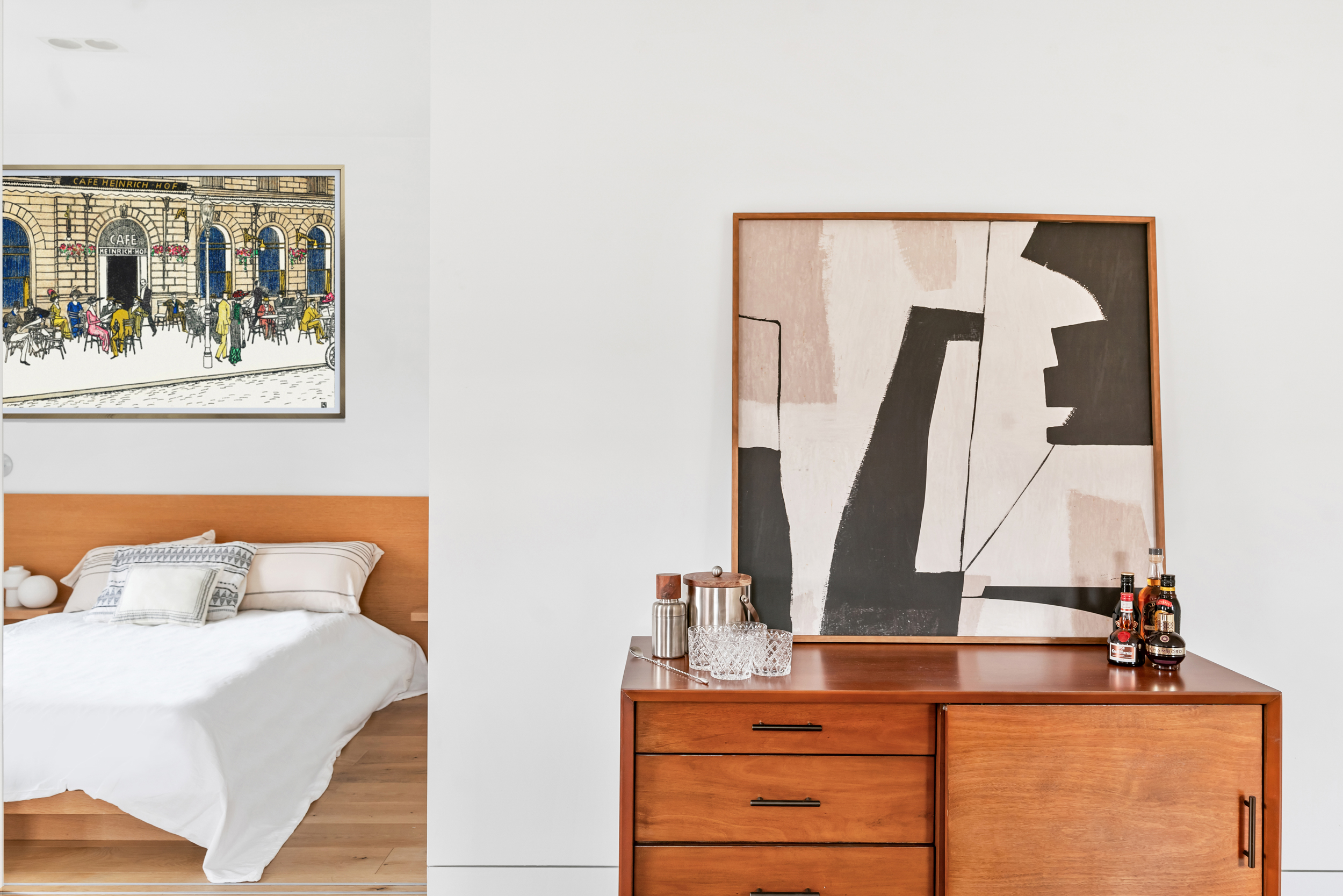 61 Horatio Street, Unit 5F Manhattan, NY 10014 - Photo 5 of 11 a view of a bedroom with a bed and a cabinet