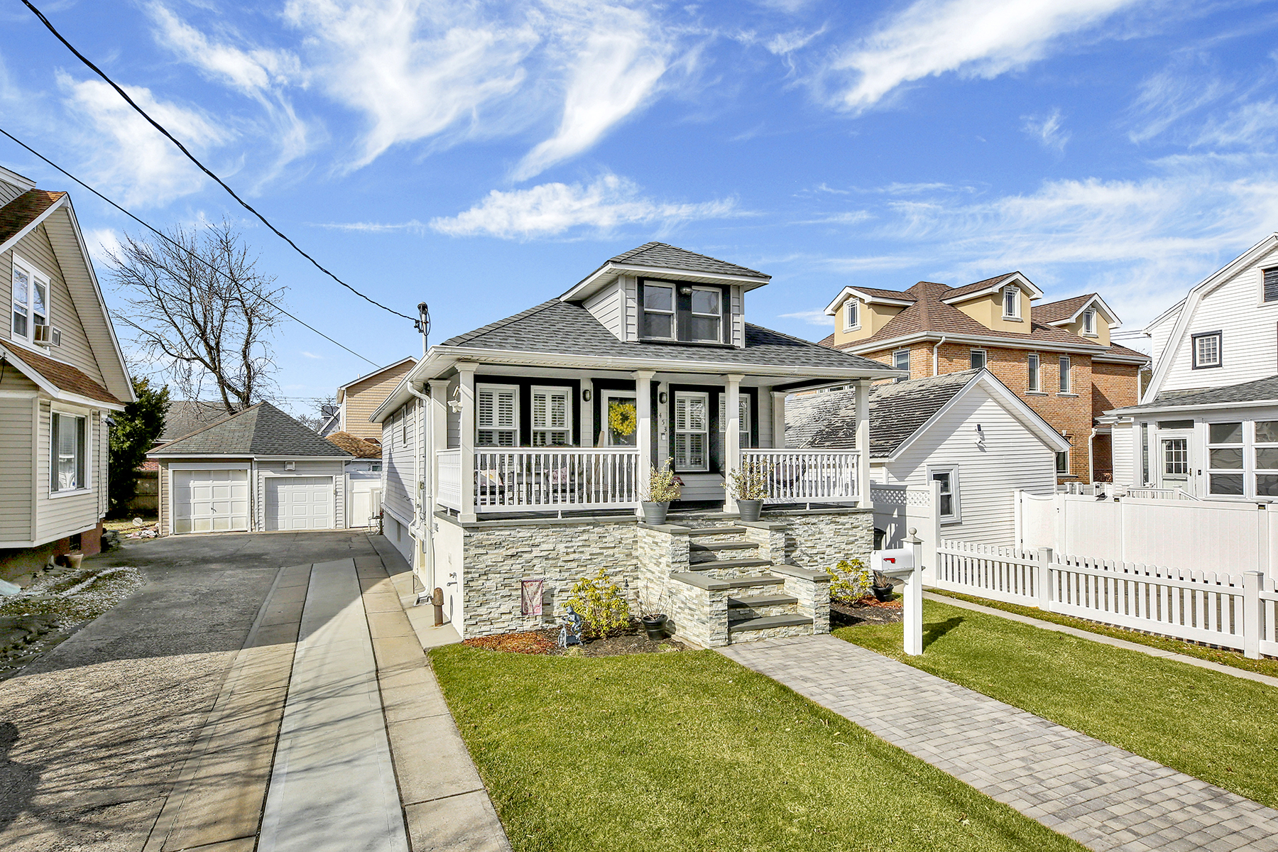 4-53 Beach 142nd Street Queens, NY 11694 - Photo 2 of 39 a front view of a house with a yard