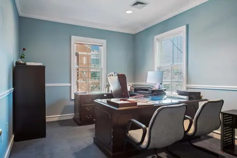 a view of entryway with kitchen