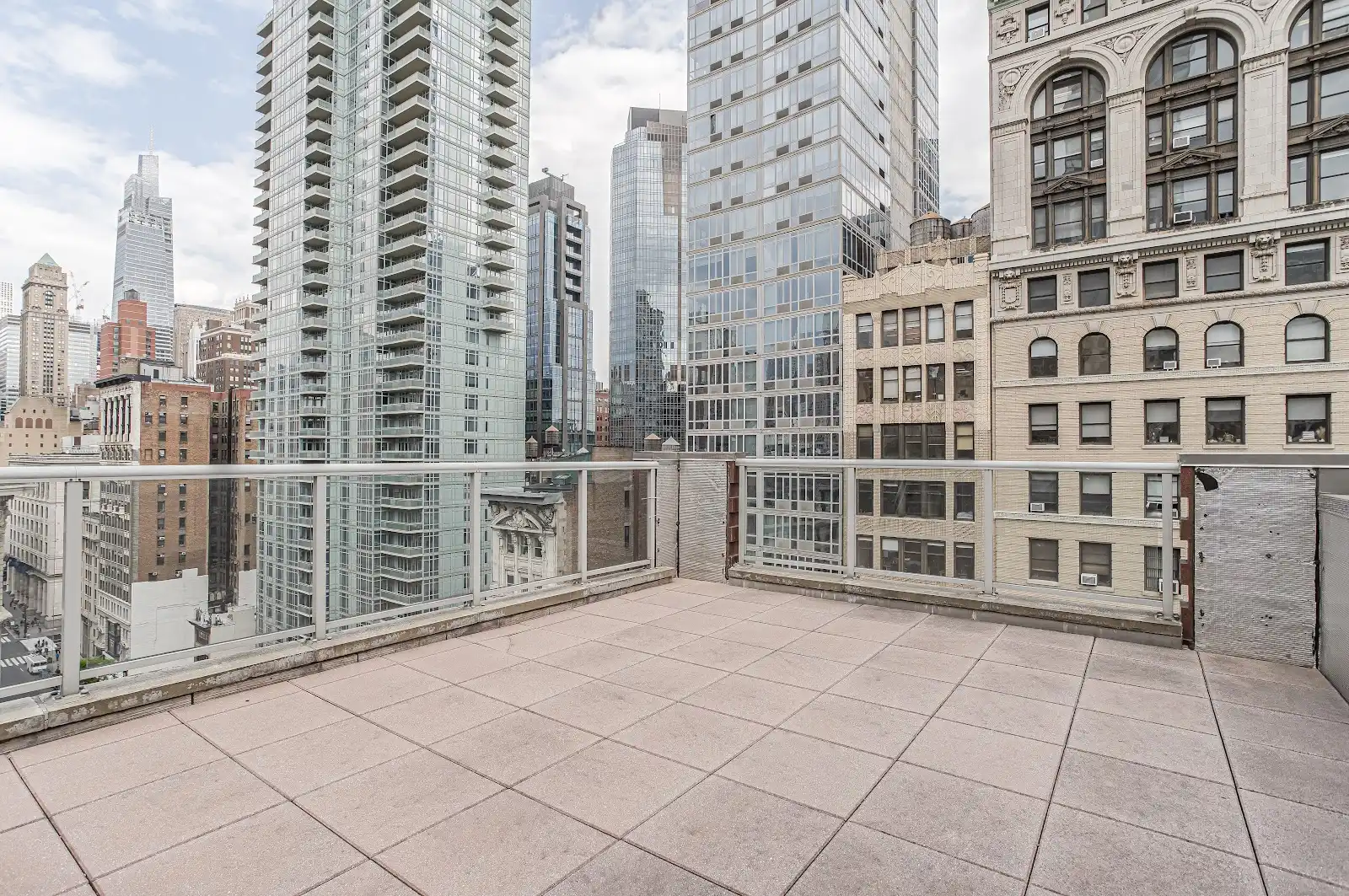 304 5th Avenue Manhattan, NY 10001 - Photo 4 of 6 a view of a balcony with a bench