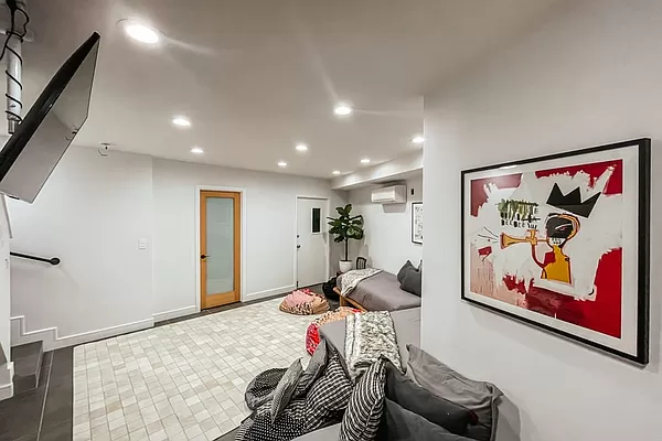 334 Plymouth Street Brooklyn, NY 11201 - Photo 27 of 32 a bedroom with furniture and a rug