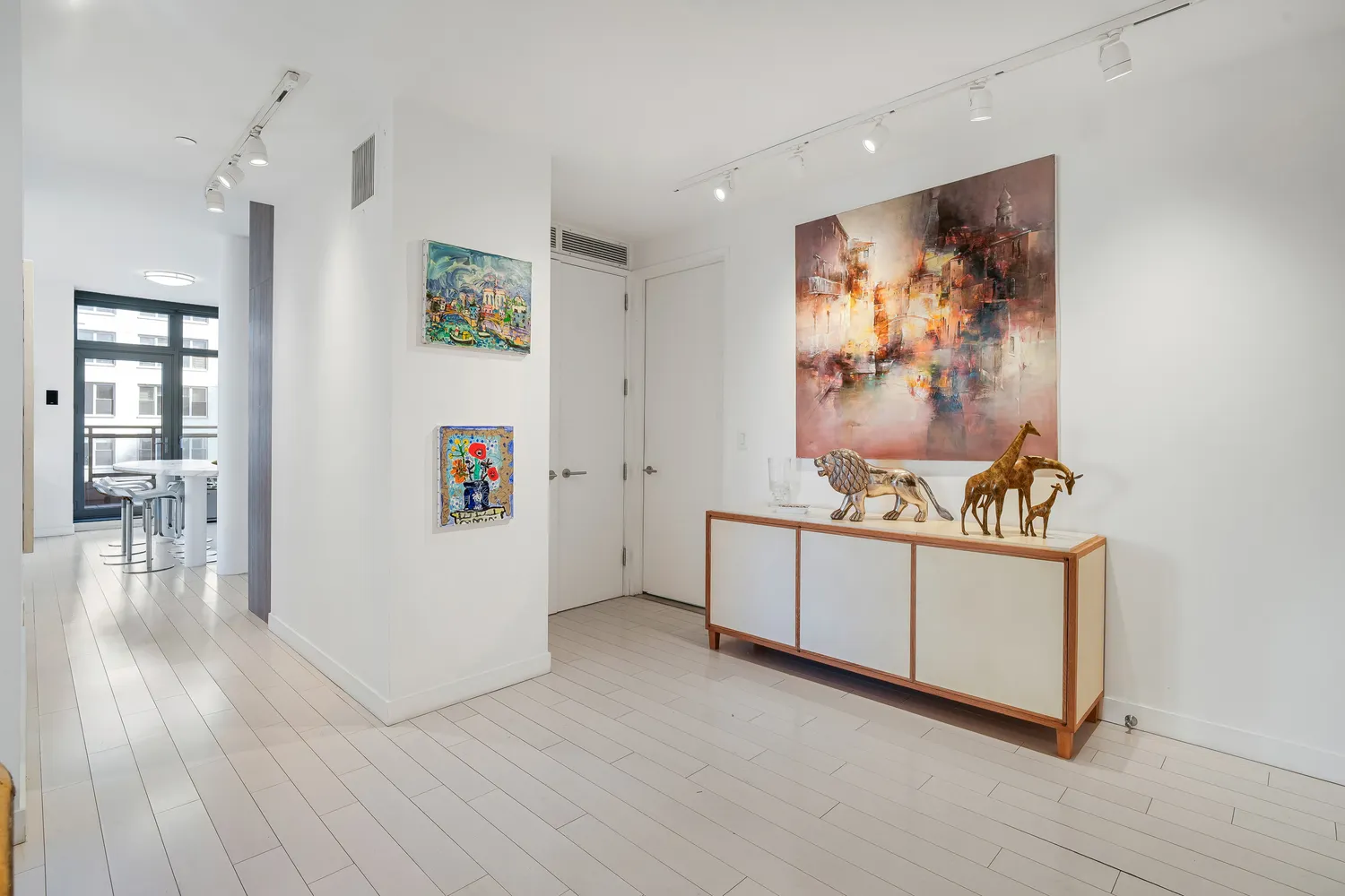 a room with furniture and wooden floor