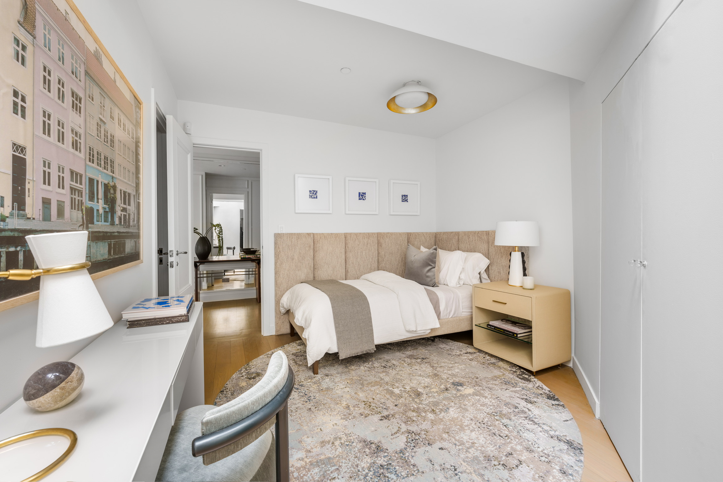 1200 Broadway, Unit PH89 Manhattan, NY 10001 - Photo 30 of 47 a bed room with a bed and a couch