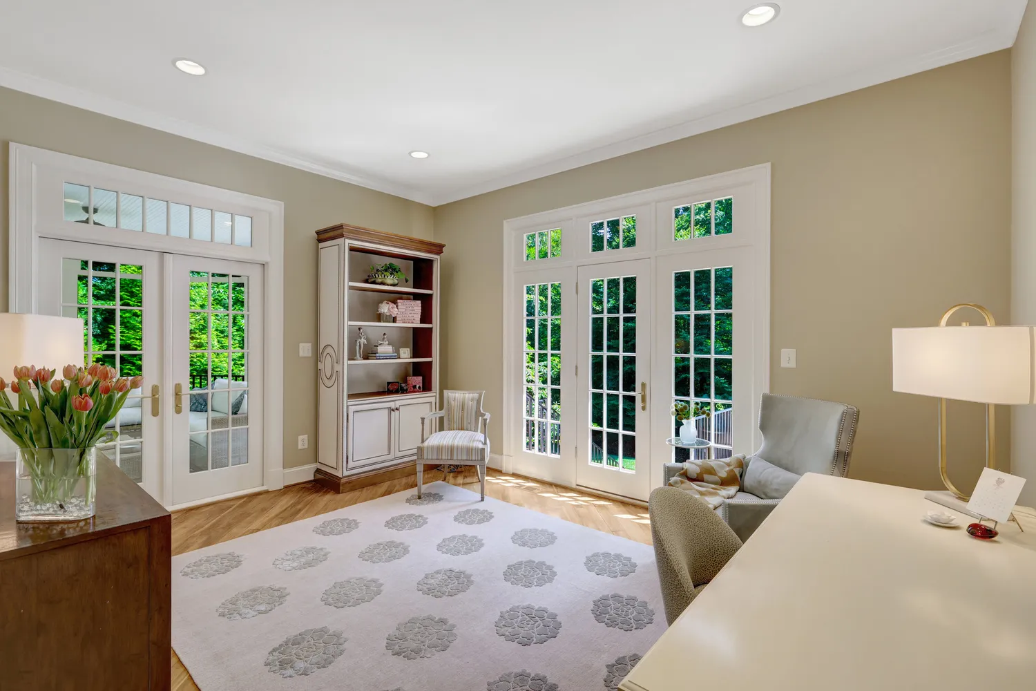 a white bath tub sitting in front of a window