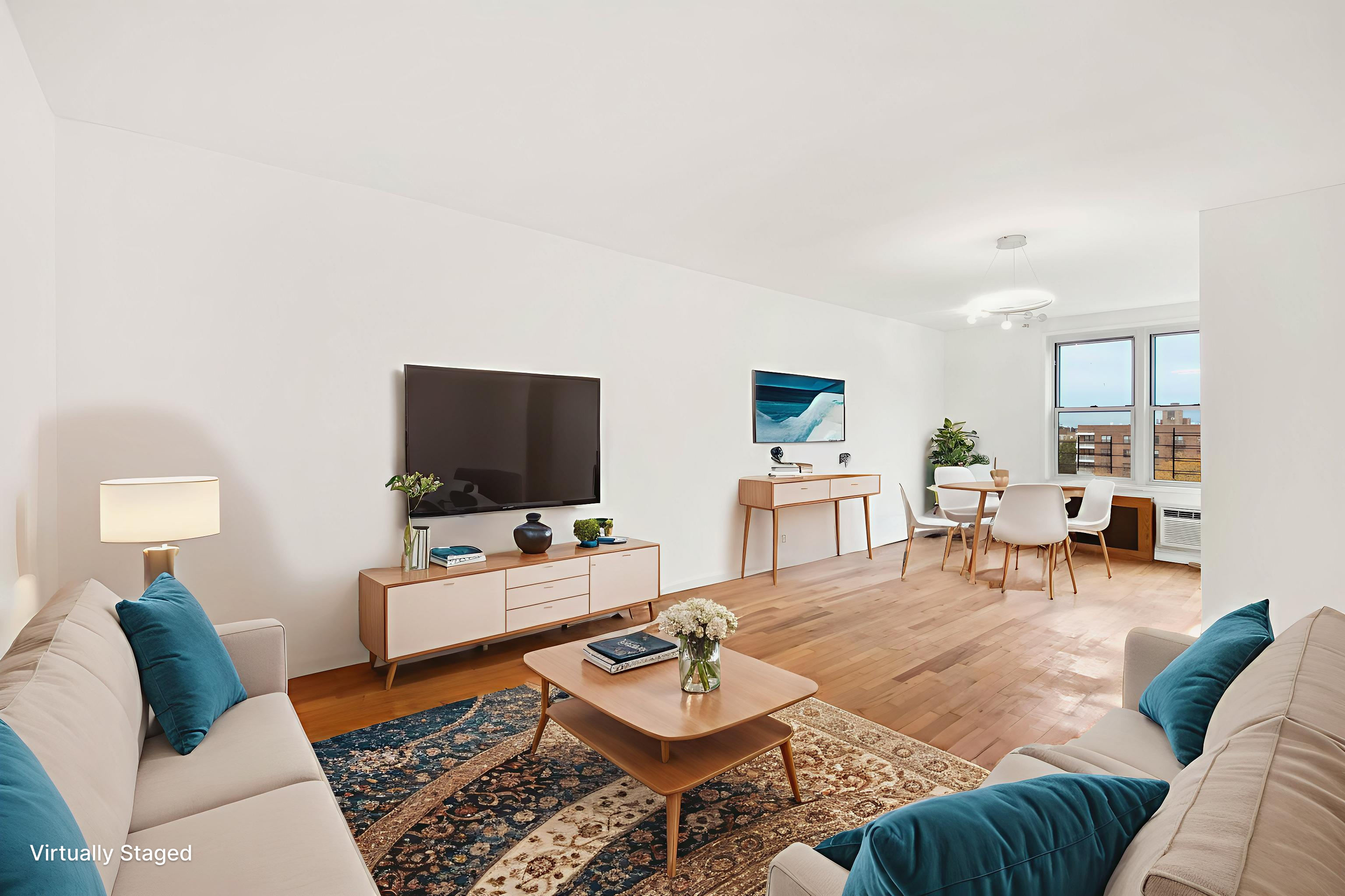 2665 Homecrest Avenue, Unit 6Z Brooklyn, NY 11235 - Photo 1 of 6 a living room with furniture and a flat screen tv