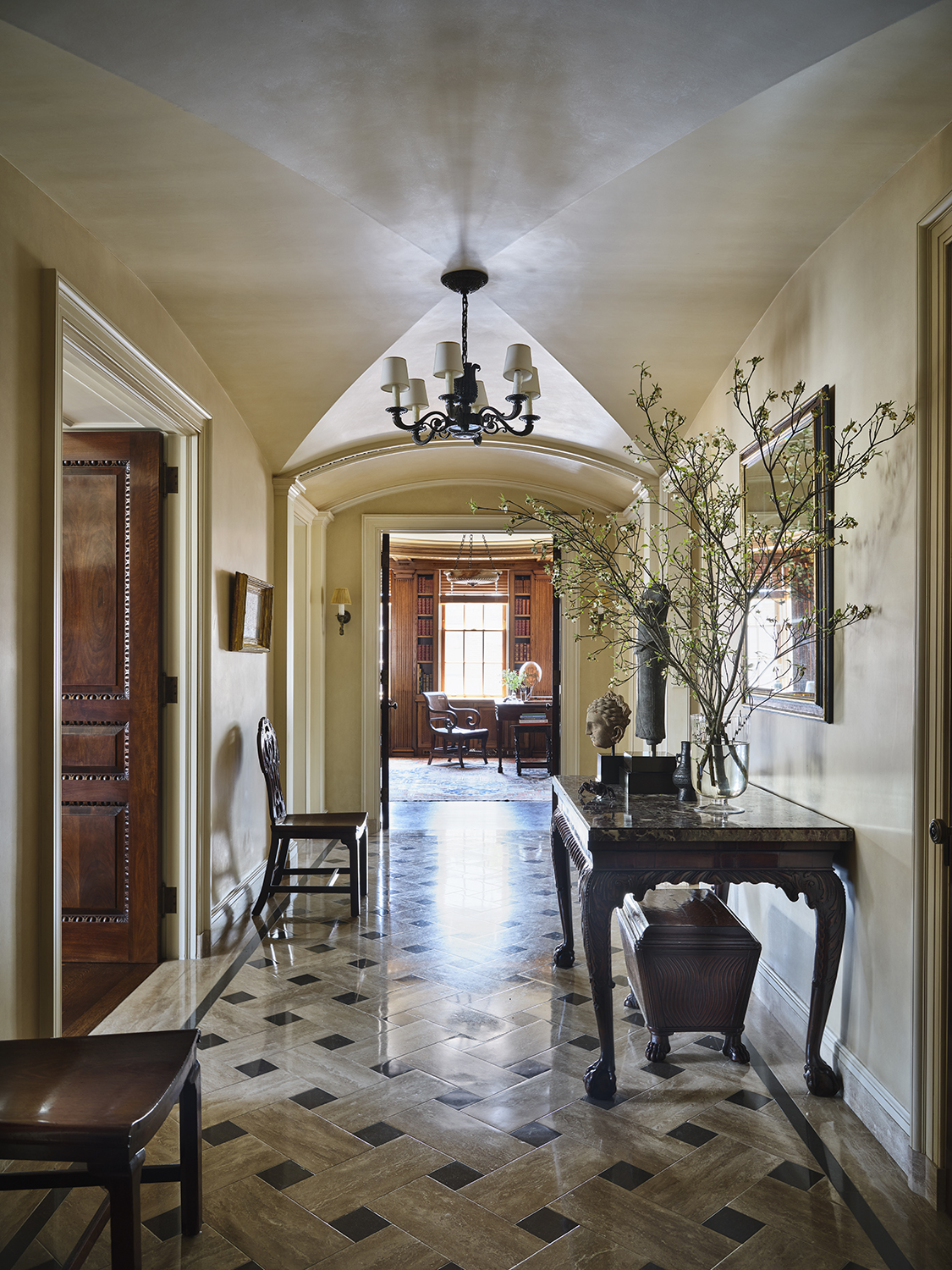 620 Park Avenue, Unit 14 Manhattan, NY 10065 - Photo 11 of 32 a view of a dining room with furniture and a chandelier