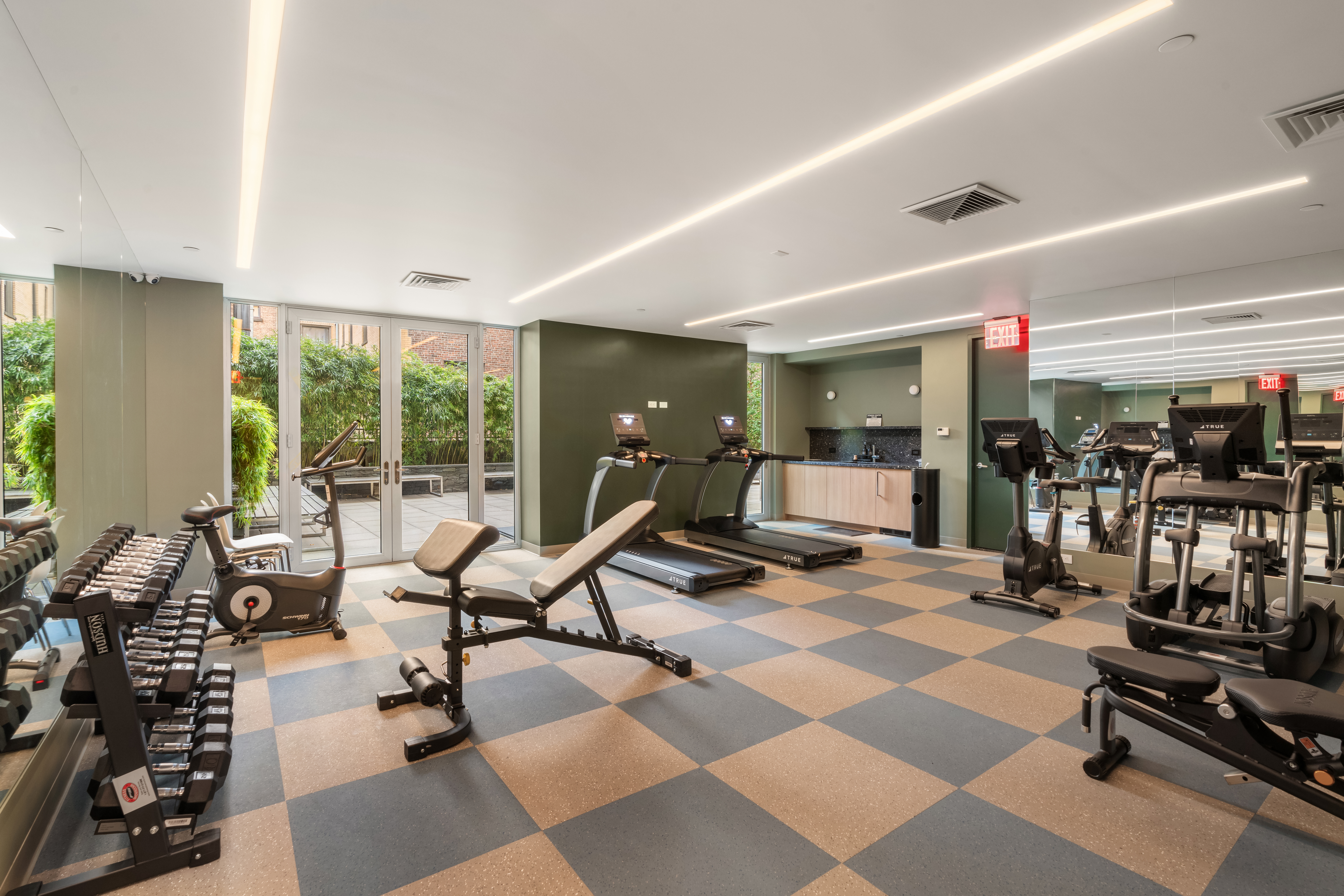 545 West 110th Street, Unit 9D Manhattan, NY 10025 - Photo 14 of 17 a view of a room with gym equipment