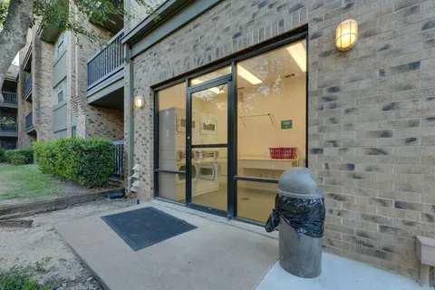 a view of balcony with wooden floor