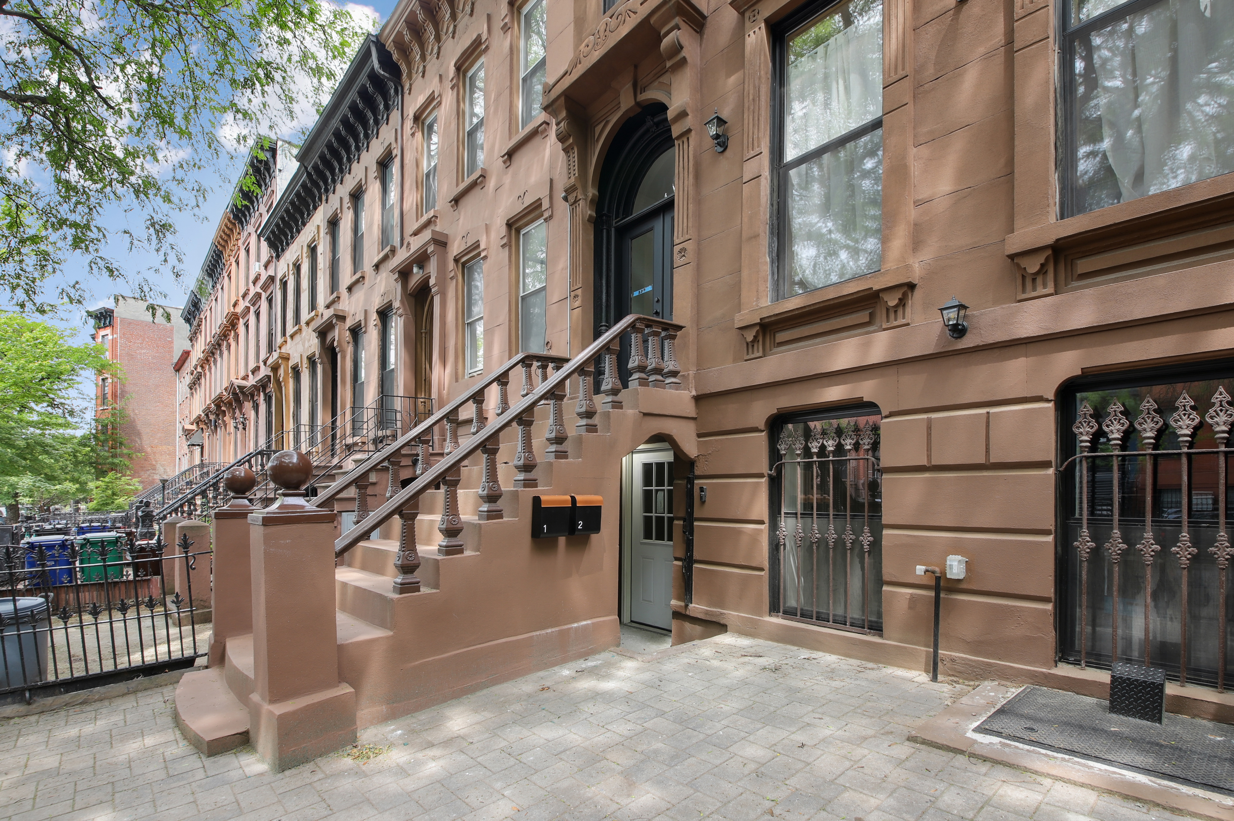 239 Madison Street, Unit 1 Brooklyn, NY 11216 - Photo 14 of 14 front view of a building