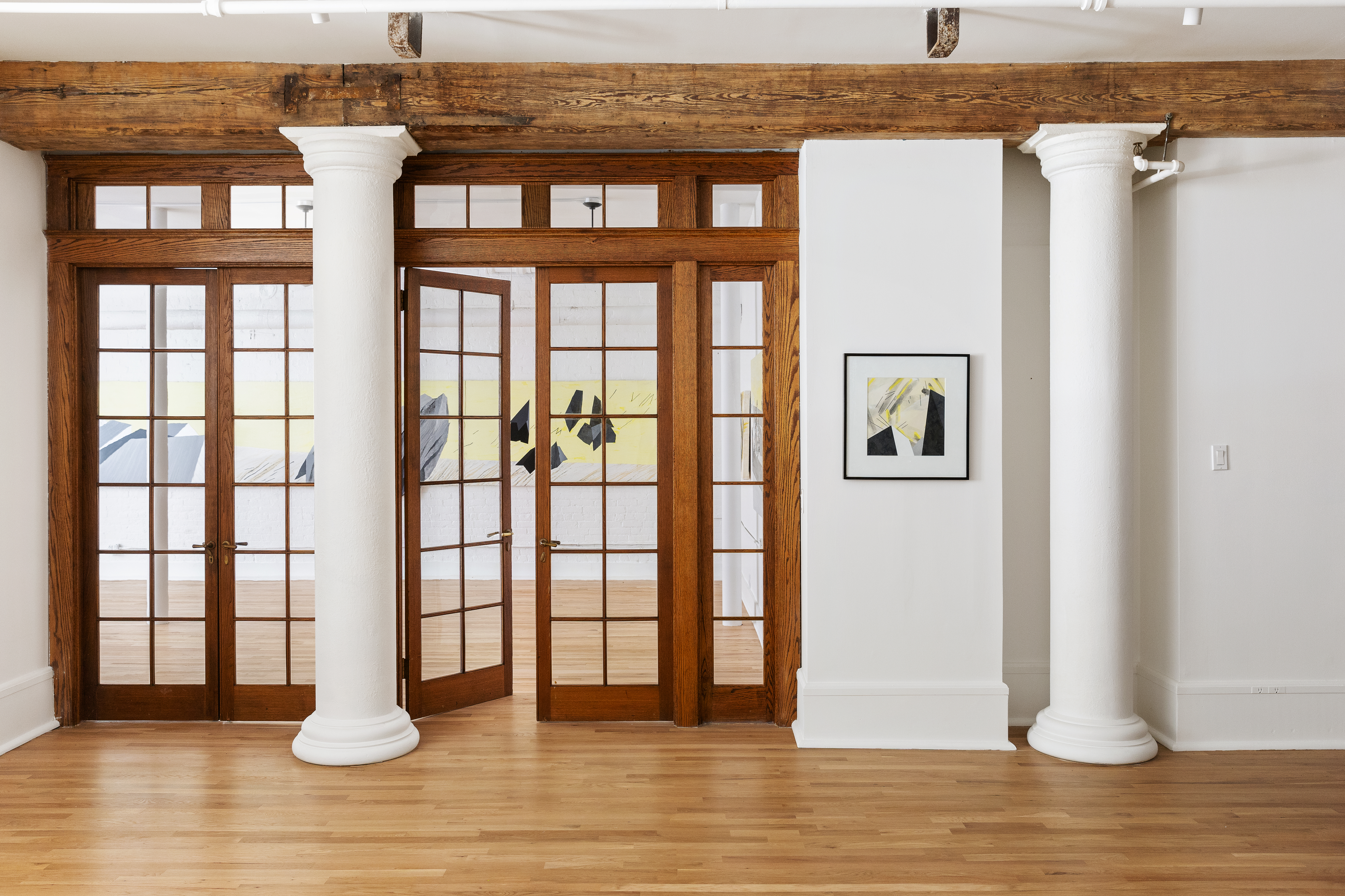 144 Franklin Street, Unit B Manhattan, NY 10013 - Photo 2 of 14 a view of entryway and hall with wooden floor