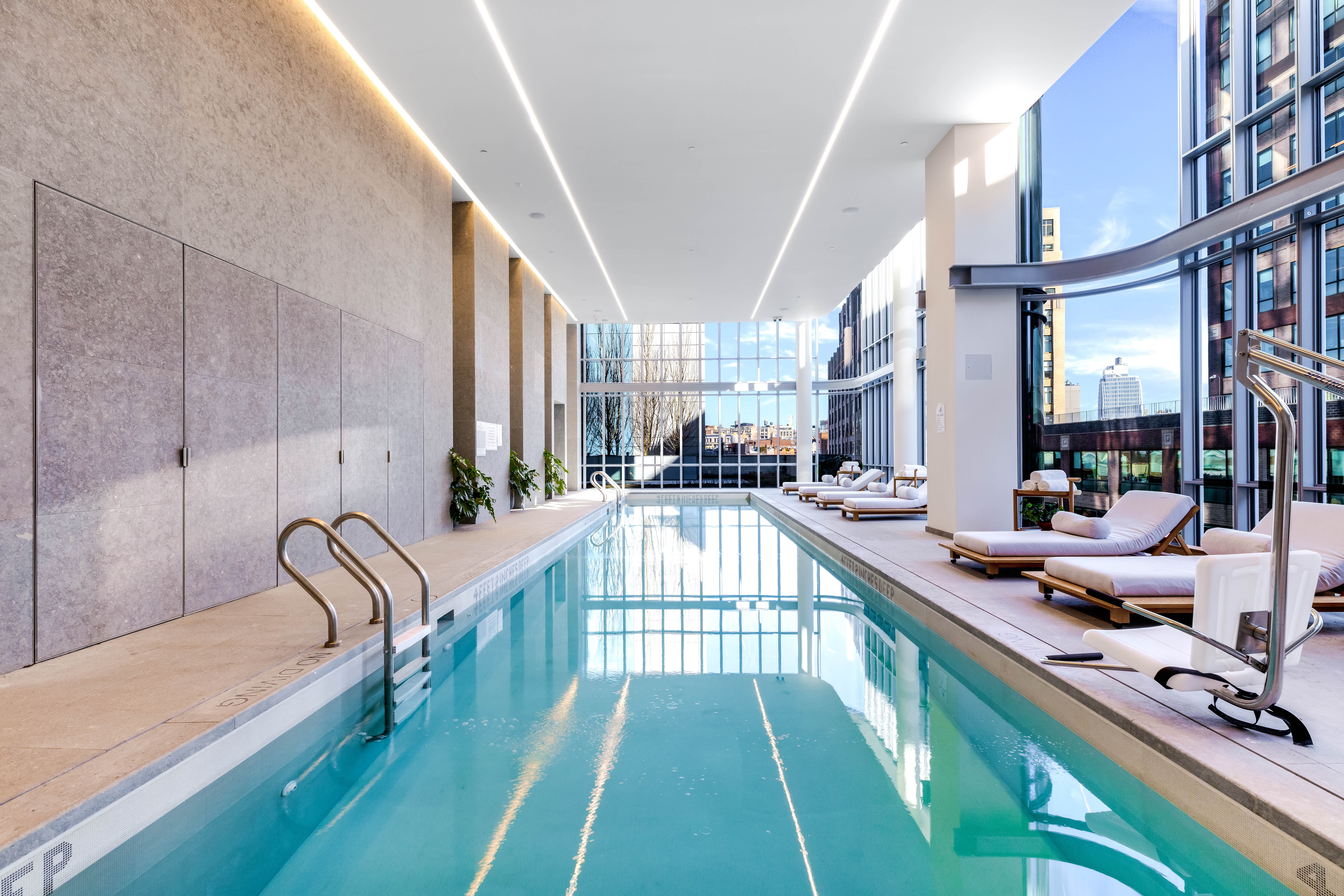 565 Broome Street, Unit S9A Manhattan, NY 10013 - Photo 13 of 19 a view of a kitchen with kitchen island granite countertop lots of counter top space