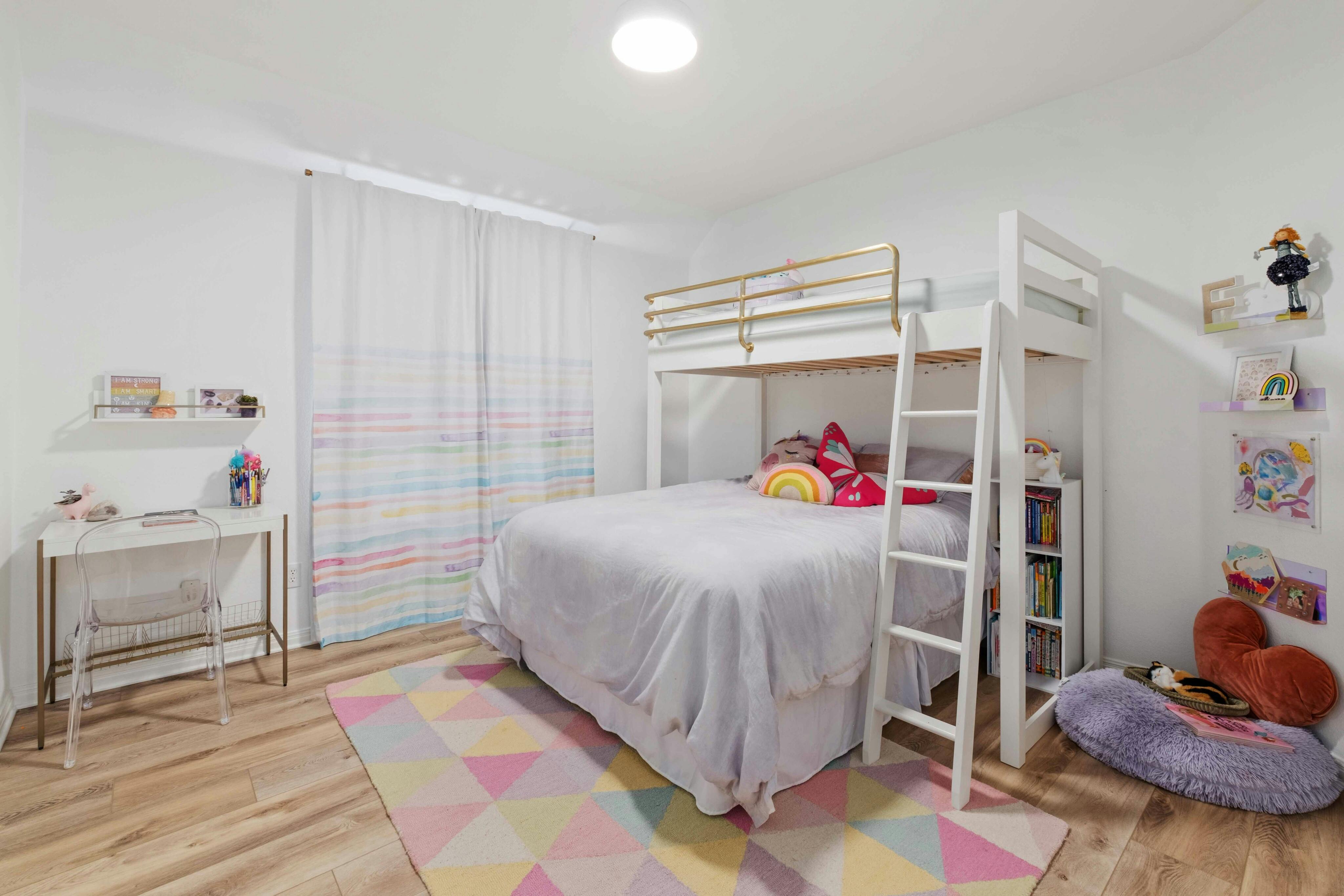 10608 Pointe View Drive Austin, TX 78738 - Photo 26 of 46 a bedroom with a bed and a window