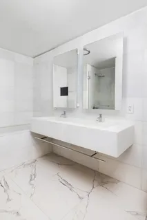 a bathroom with a sink and a bathtub