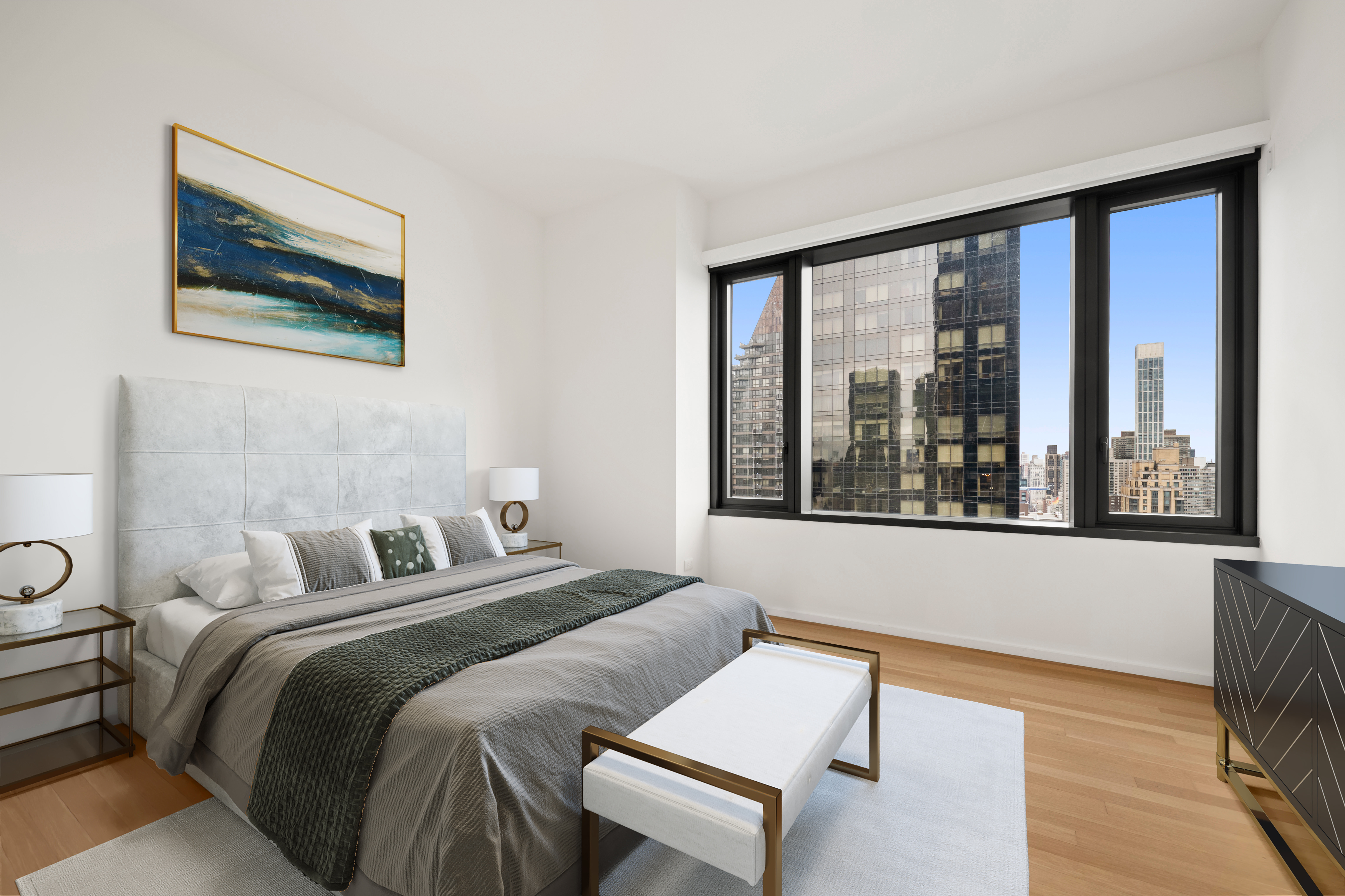 50 United Nations Plaza, Unit 34B Manhattan, NY 10017 - Photo 10 of 17 a bedroom with a bed and a large window