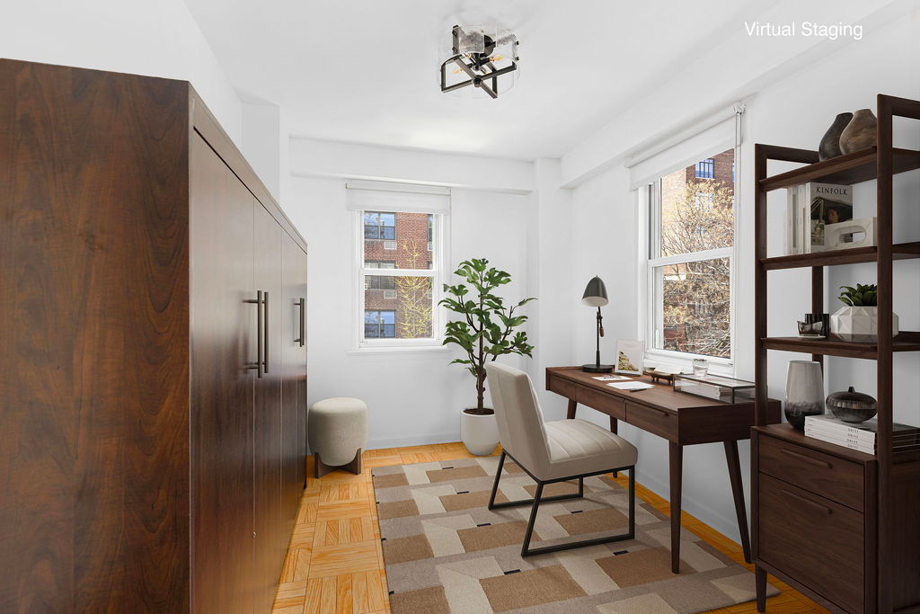 101 West 12th Street, Unit 5V Manhattan, NY 10011 - Photo 5 of 26 a view of a workspace with furniture and a window