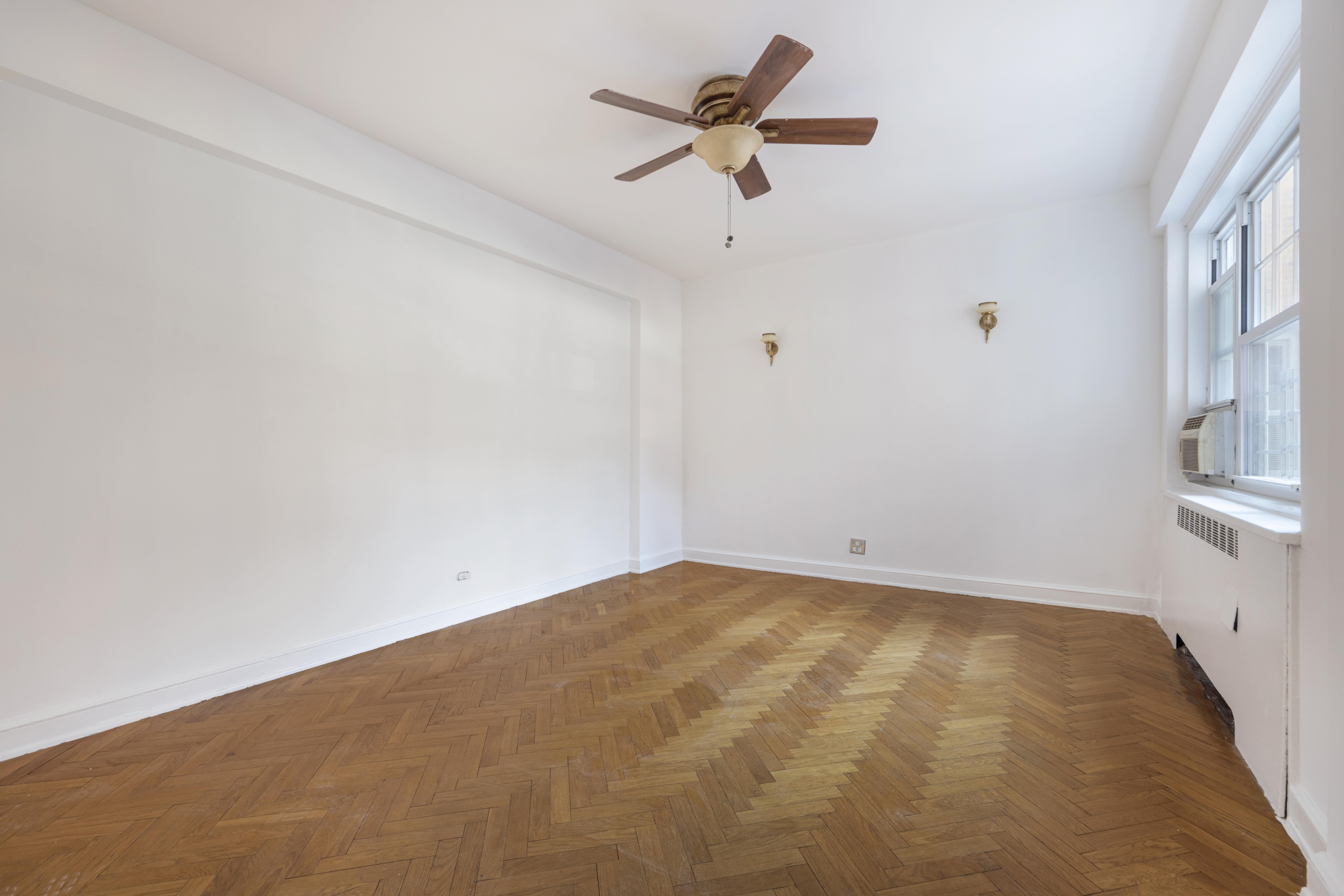 200 Cabrini Boulevard, Unit 17 Manhattan, NY 10033 - Photo 9 of 24 a view of empty room with ceiling fan